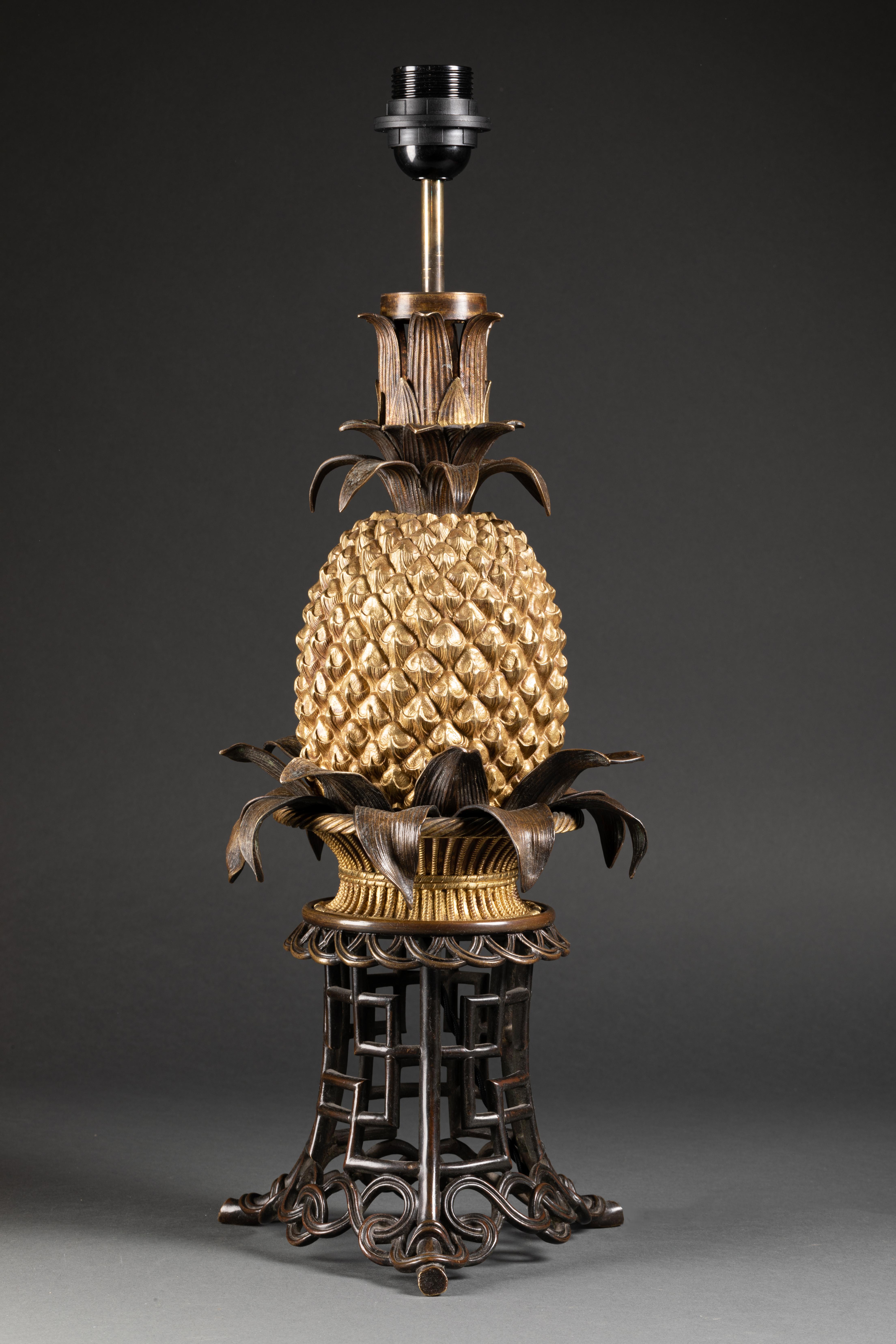 Very rare model of a pineapple lamp on a wicker basket with a chinoiserie base, all bronze. France, circa 1860. Wired to the EU standard. Sold with or without lampshade. Height to socket 57 cm.