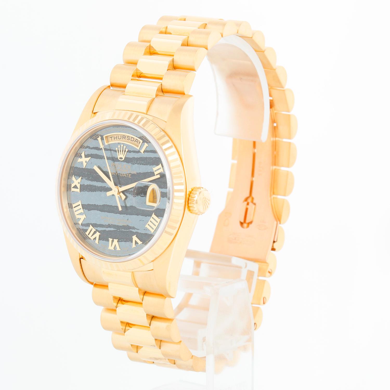 rolex day date de oro