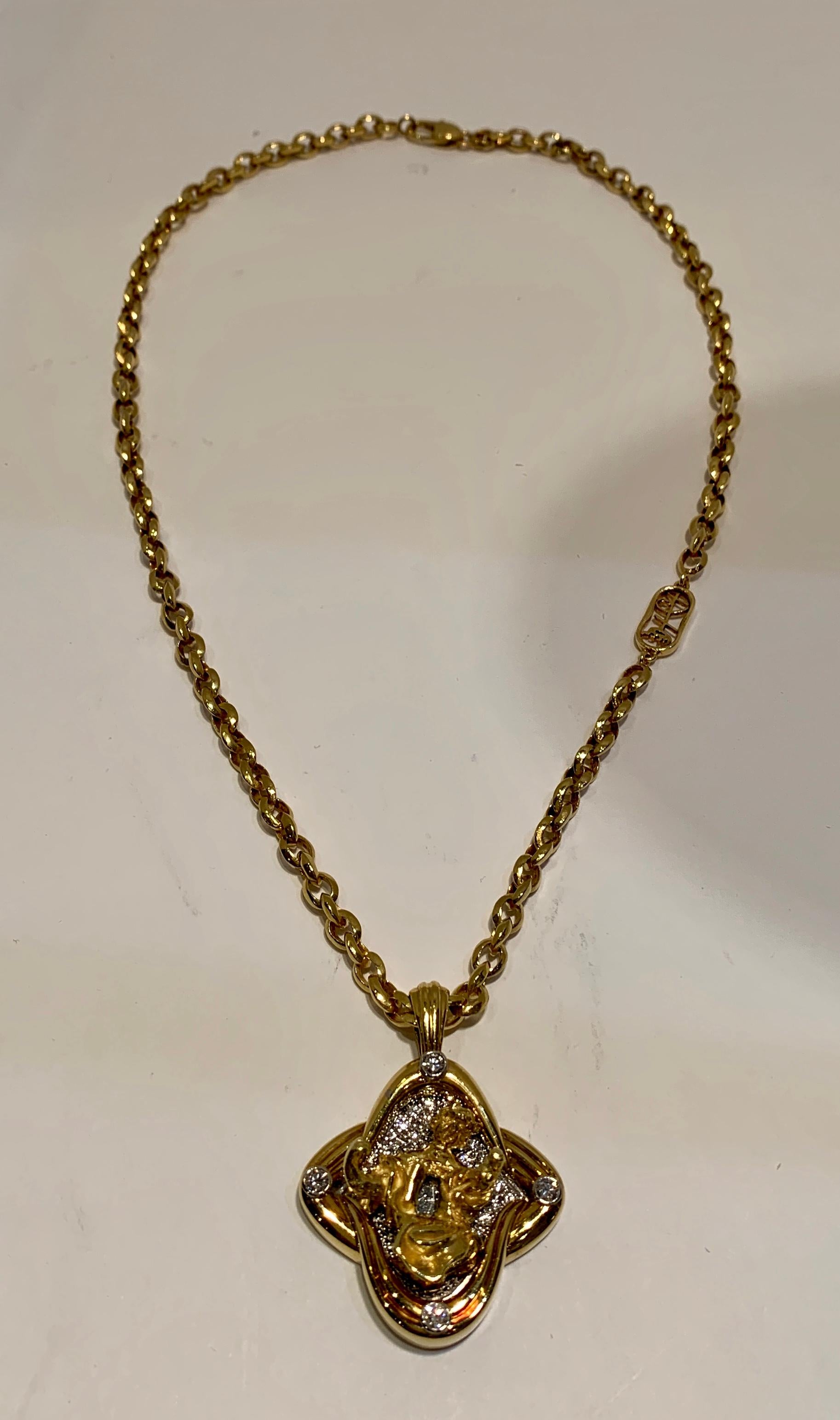 Very rare and collectible Salvador Dali “Madonna de Port Lligat” signed 2 carat diamond necklace in heavy 18 karat yellow and white gold is a limited edition jewelry work of art of only ten pieces made in the world. 

The pendant necklace is signed