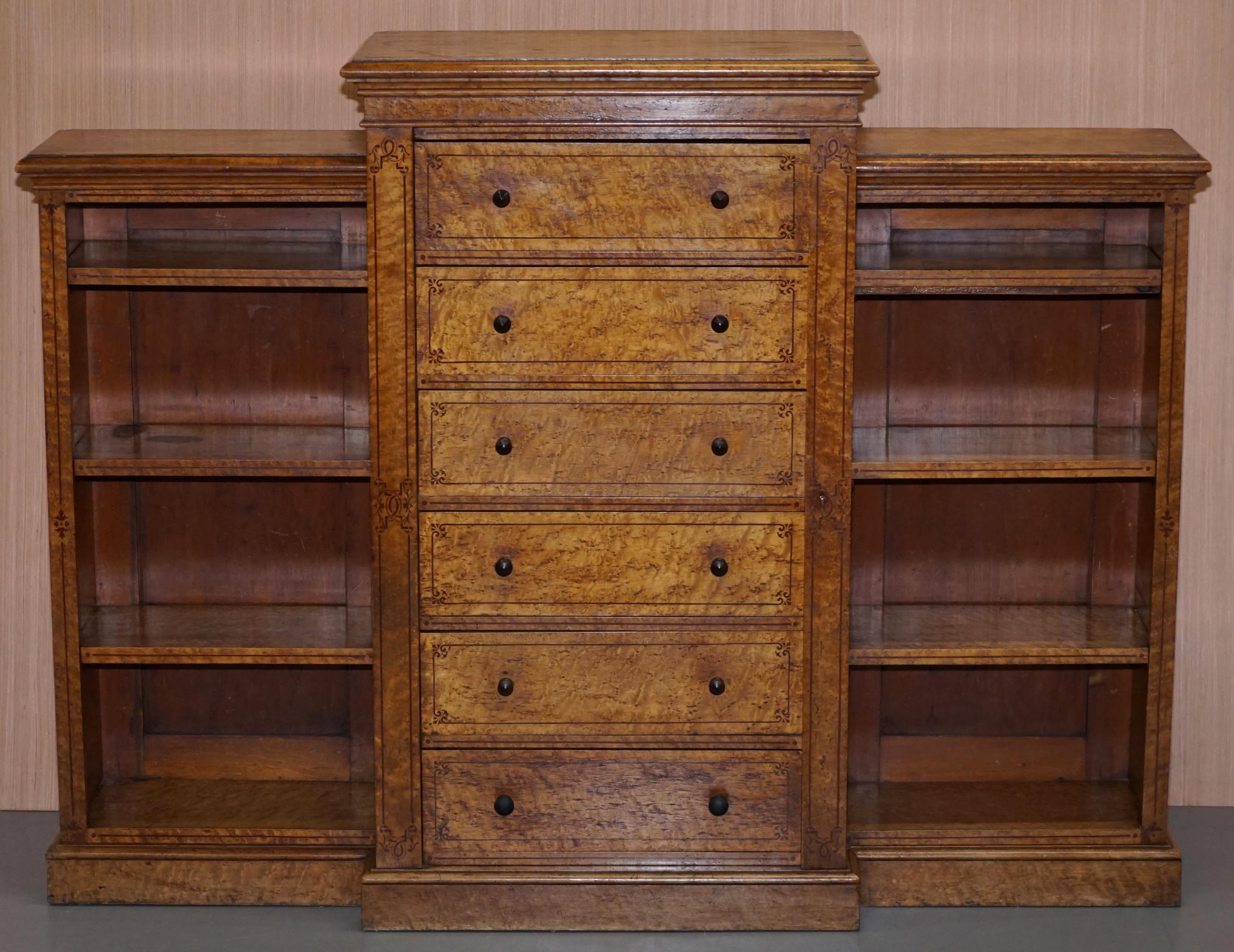 We are delighted to offer for sale this stunning very rare Victorian satinwood and burr walnut Wellington chest of drawers with built in bookcases

I have never seen a Wellington chest with a built bookcase before, it is really quite sublime. The