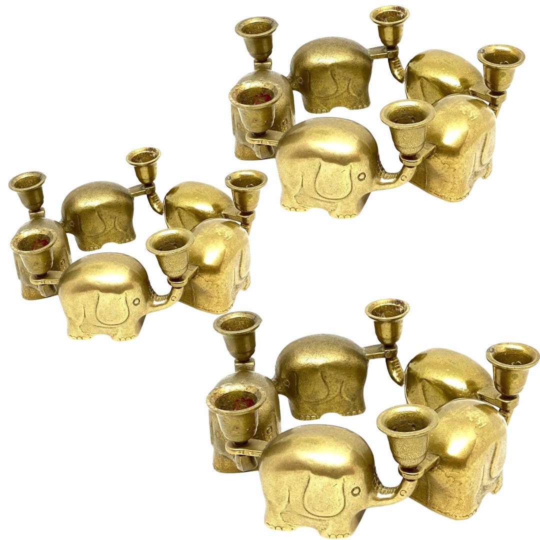 Very rare set of fifteen Art Deco brass candlesticks elephant herd, Germany, 1940s. Can be used as single or in a chain. Each one is approximate 2 5/8