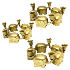 Very Rare Set of Fifteen Art Deco Brass Candlesticks Candleholders Elephant Herd