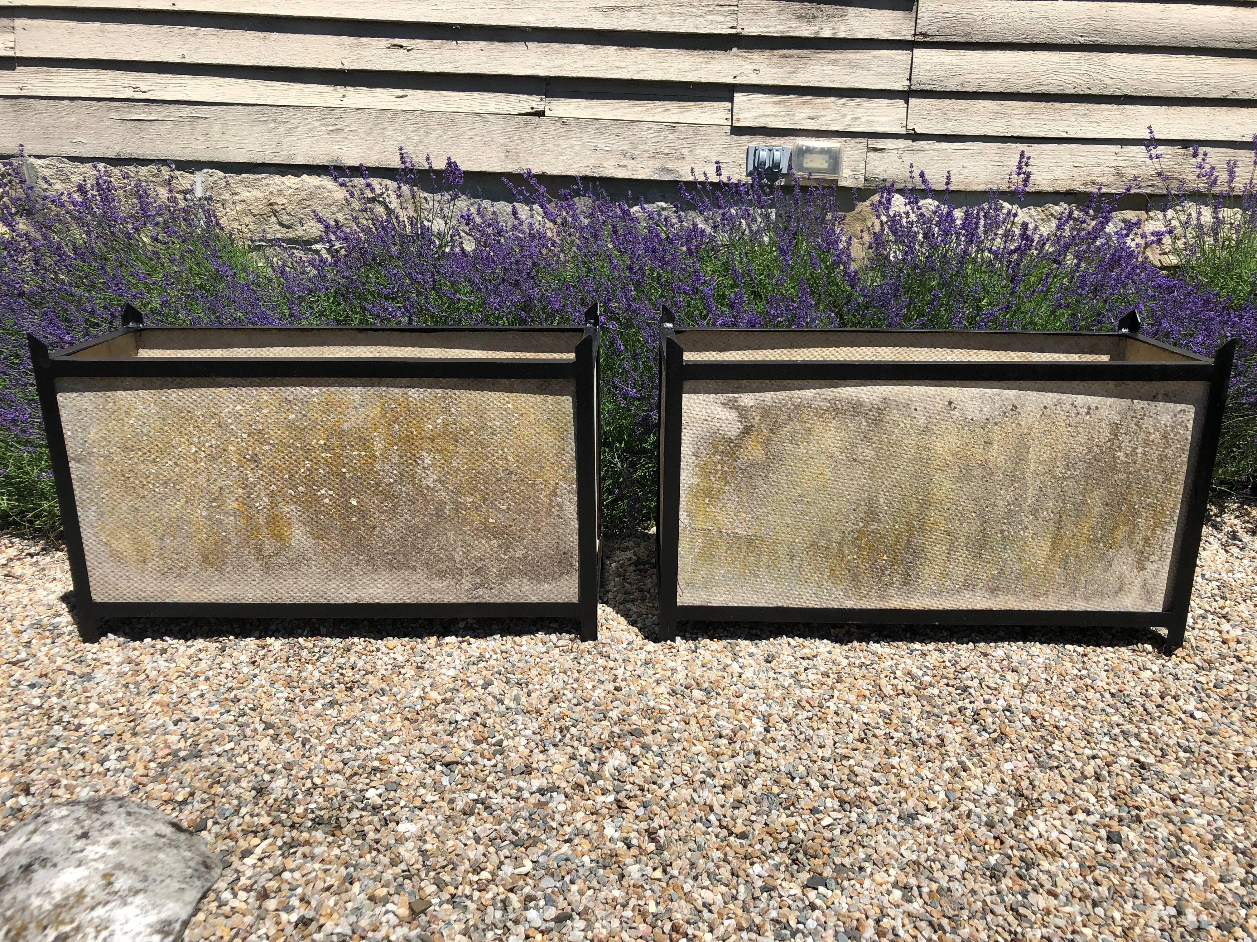 This is a very rare planter model designed by Willy Guhl and produced by Eternit of Switzerland. Documented by catalog, they feature steel frames (newly-painted in satin black by us) and lightweight, durable fiber cement panels that have been