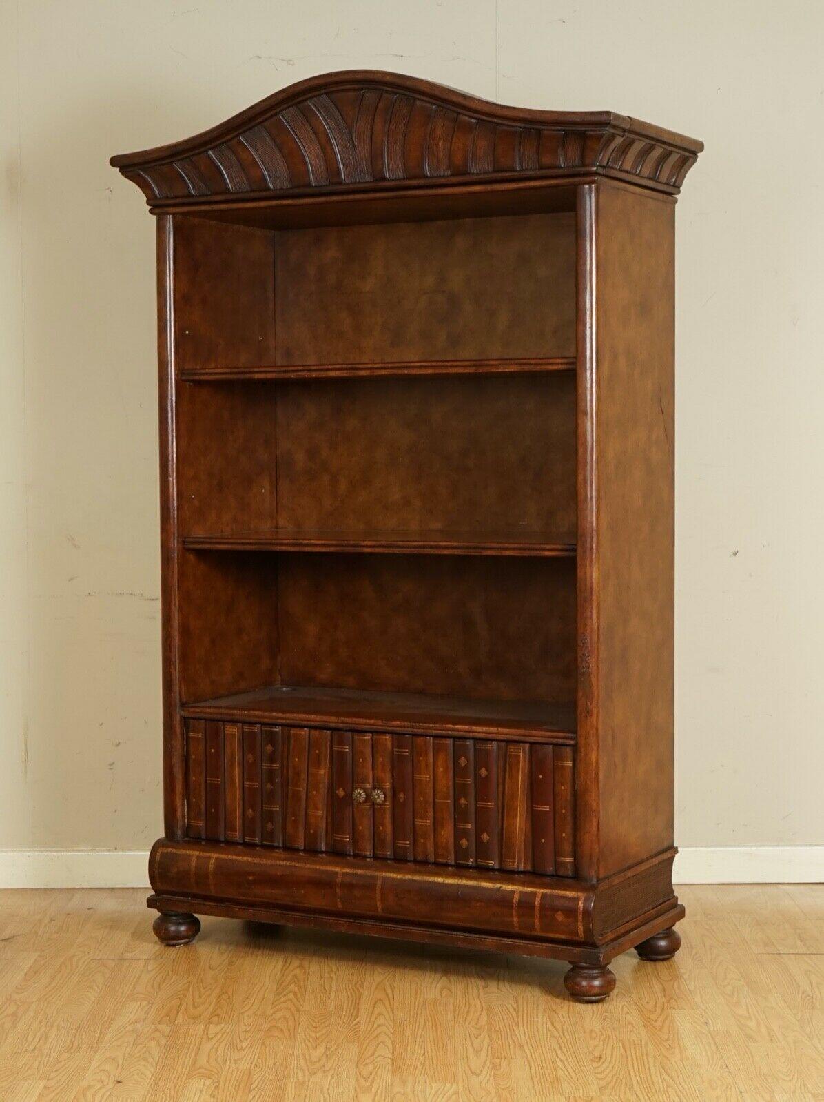 We are delighted to offer for sale this Outstanding Rare Theodore Alexander Open Leather Bookcase.

This is one of the small limited productions that Theodore Alexander had made. 

It's made from solid wood and has a lovely good quality leather