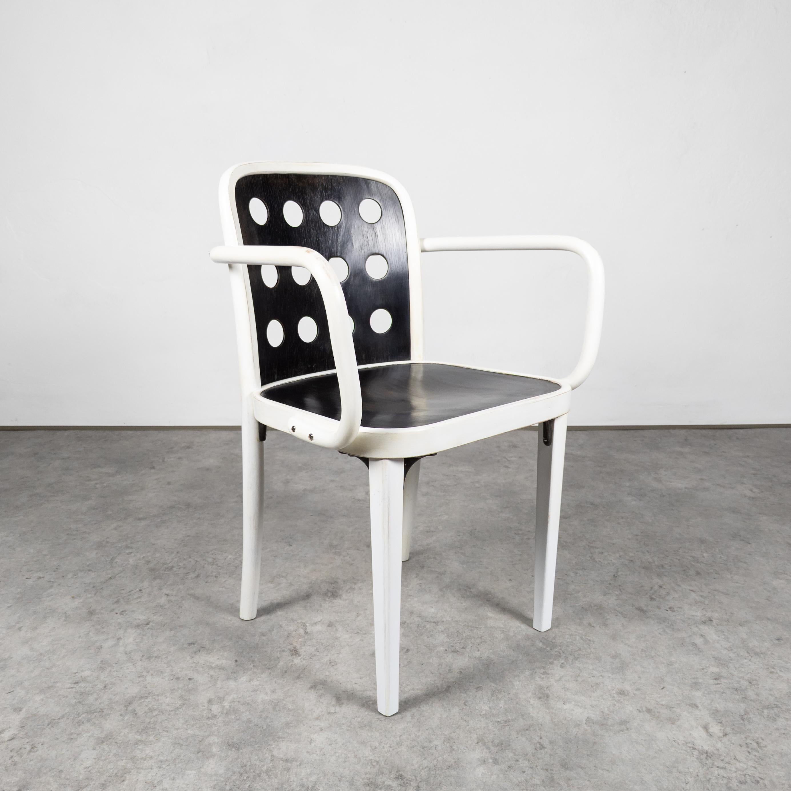 This extremely rare model was jointly designed by Josef Hoffmann and Oswald Haerdtl for the 1930 Werkbund Exhibition in Vienna. Manufactured by Thonet Mundus, 1930s. Bentwood (beech), perforated black and white coated plywood seat and backrest. With