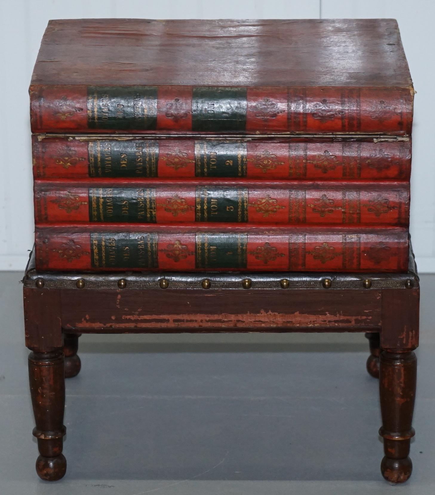 We are delighted to offer for sale this very rare original Victorian side table on stand stack of scholars books hiding a commode cupboard 

These are in period distressed condition, the leather around the outside is period and original as is the