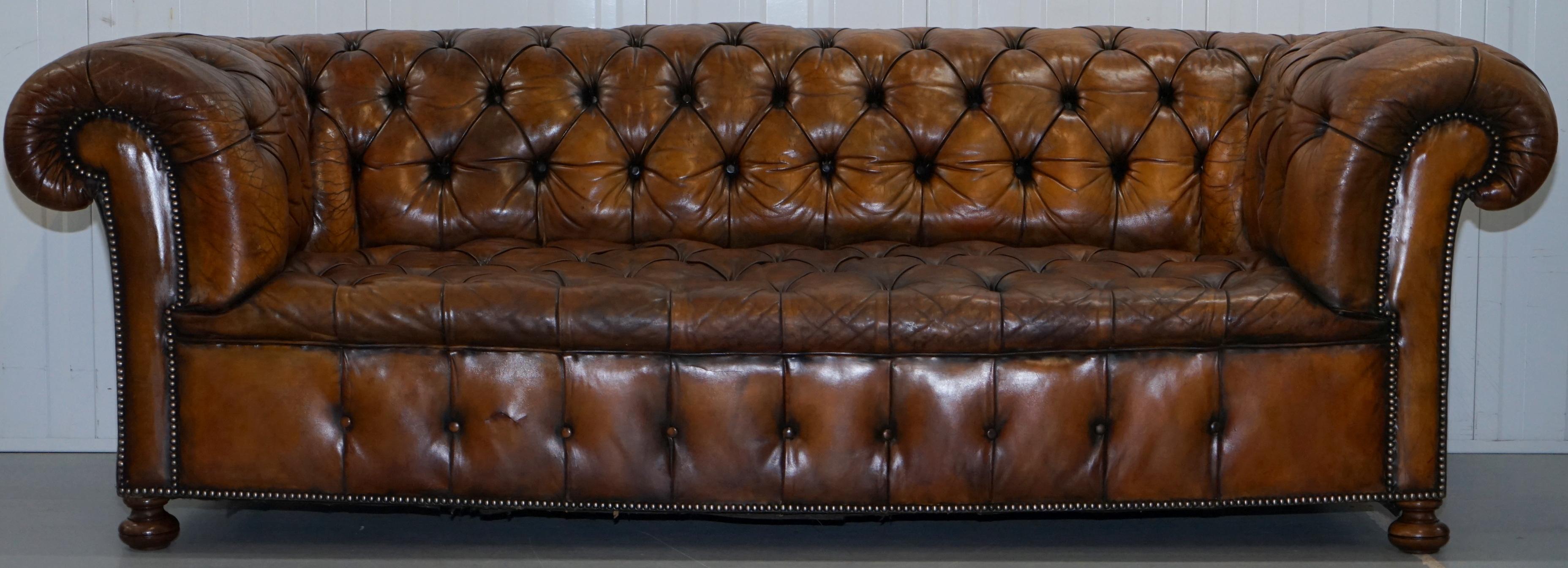 We are delighted to offer for sale this stunning exceptionally rare original early Victorian tobacco brown leather fully restored Chesterfield buttoned sofa

This is the model that everyone wants, it is the 100% perfect and correct oversized club