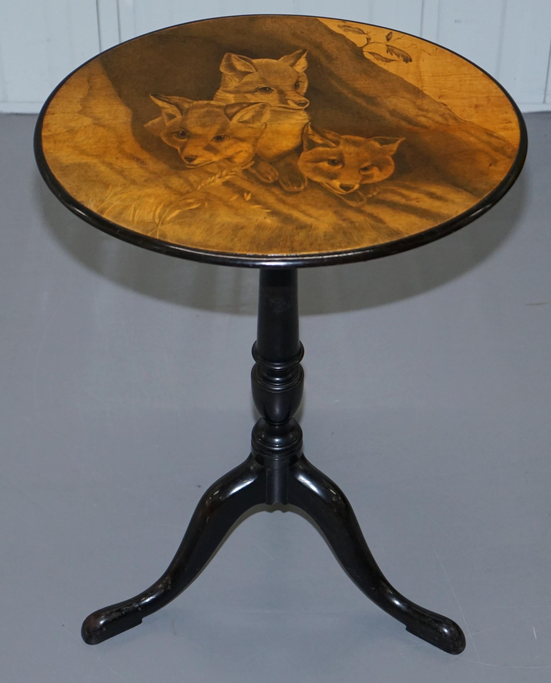 English Very Rare Victorian Tilt Top Ebonised Table with Pen Work Drawings of Fox Cubs For Sale
