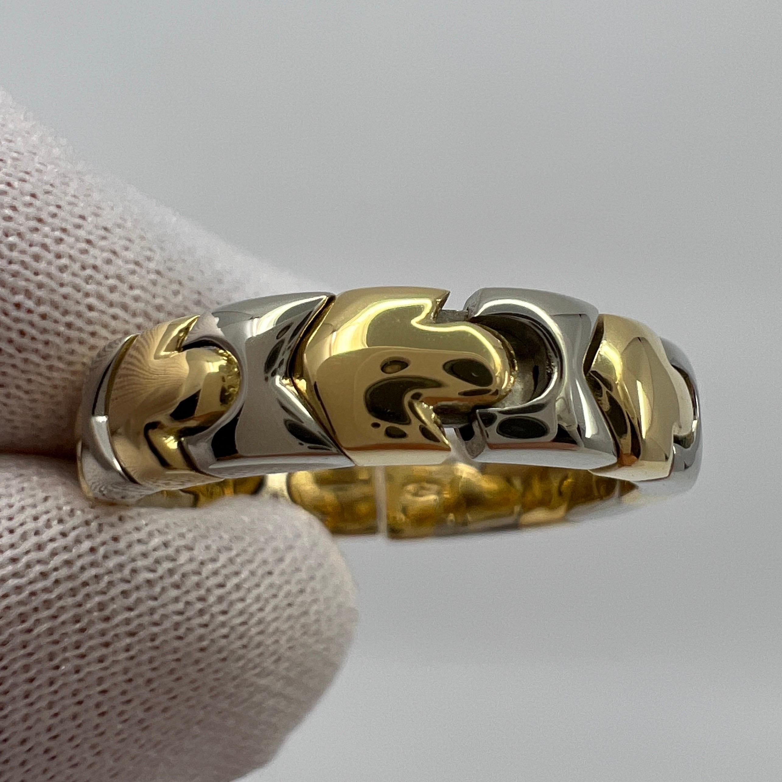 Very Rare Vintage Bvlgari Alveare 18 Karat Yellow And White Gold Spring Thin Band Ring.

A beautiful and rare vintage 18k yellow & white gold Bvlgari Alveare ring with flexible spring design.
This stylish and unique spring design allows it to fit