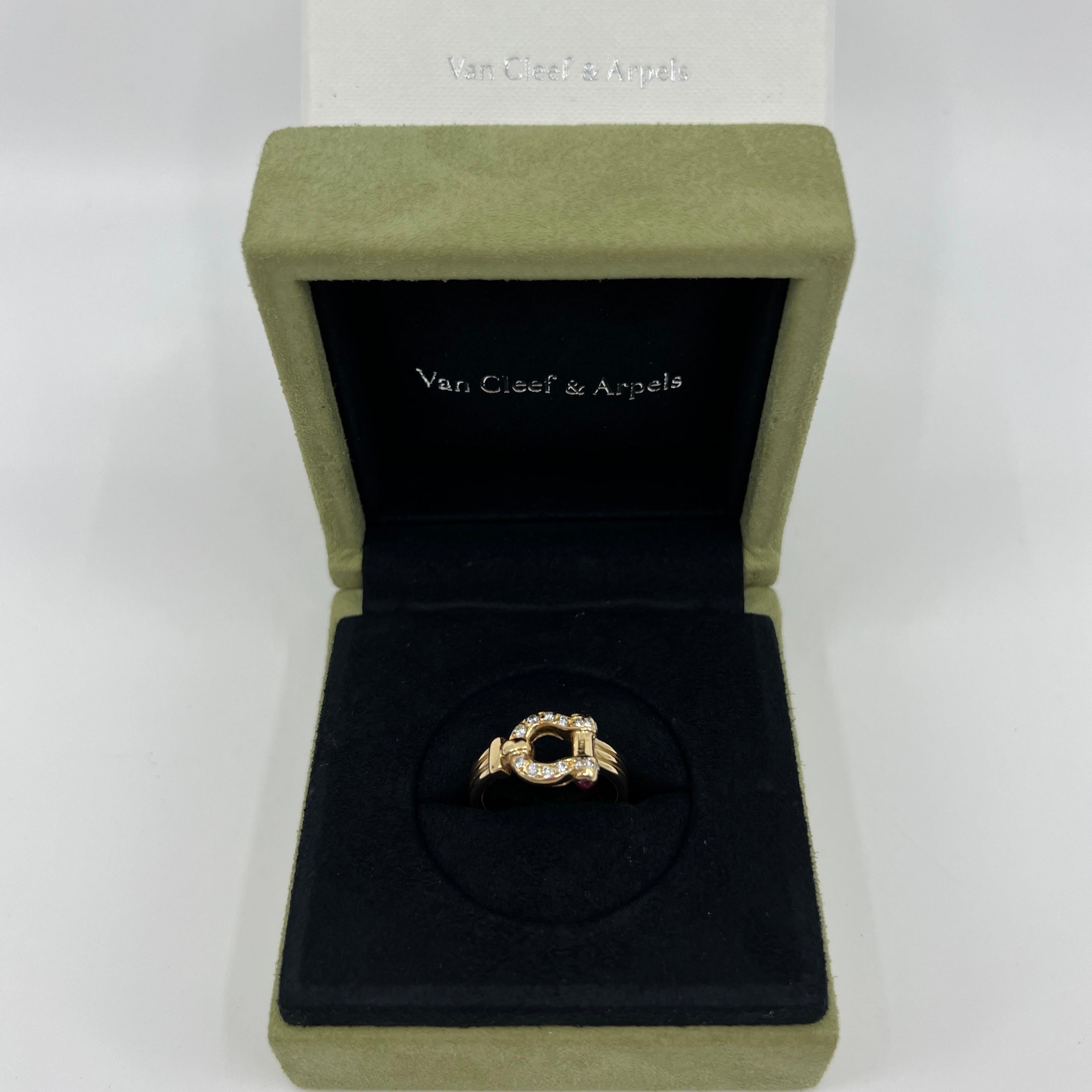 Very Rare Vintage Van Cleef & Arpels 18k Yellow Gold Diamond And Ruby Buckle Ring.

This beautifully made ring featuring round brilliant cut diamonds and round cabochon rubies beautifully set in a buckle style ring.

The diamonds and rubies are of