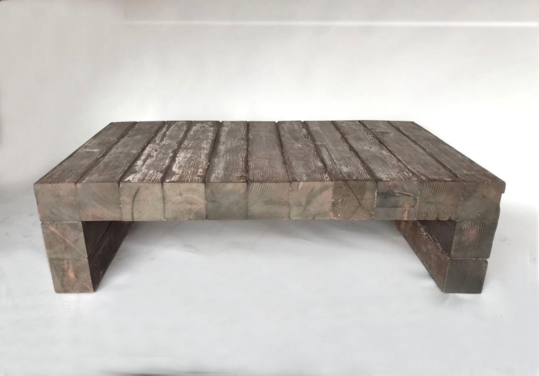 Here is a coffee table perfect for your cabin or rustic living room! It can even go outside. It is made from vintage reclaimed Douglas fir. Very masculine, rustic modern. Some remnants of white paint.