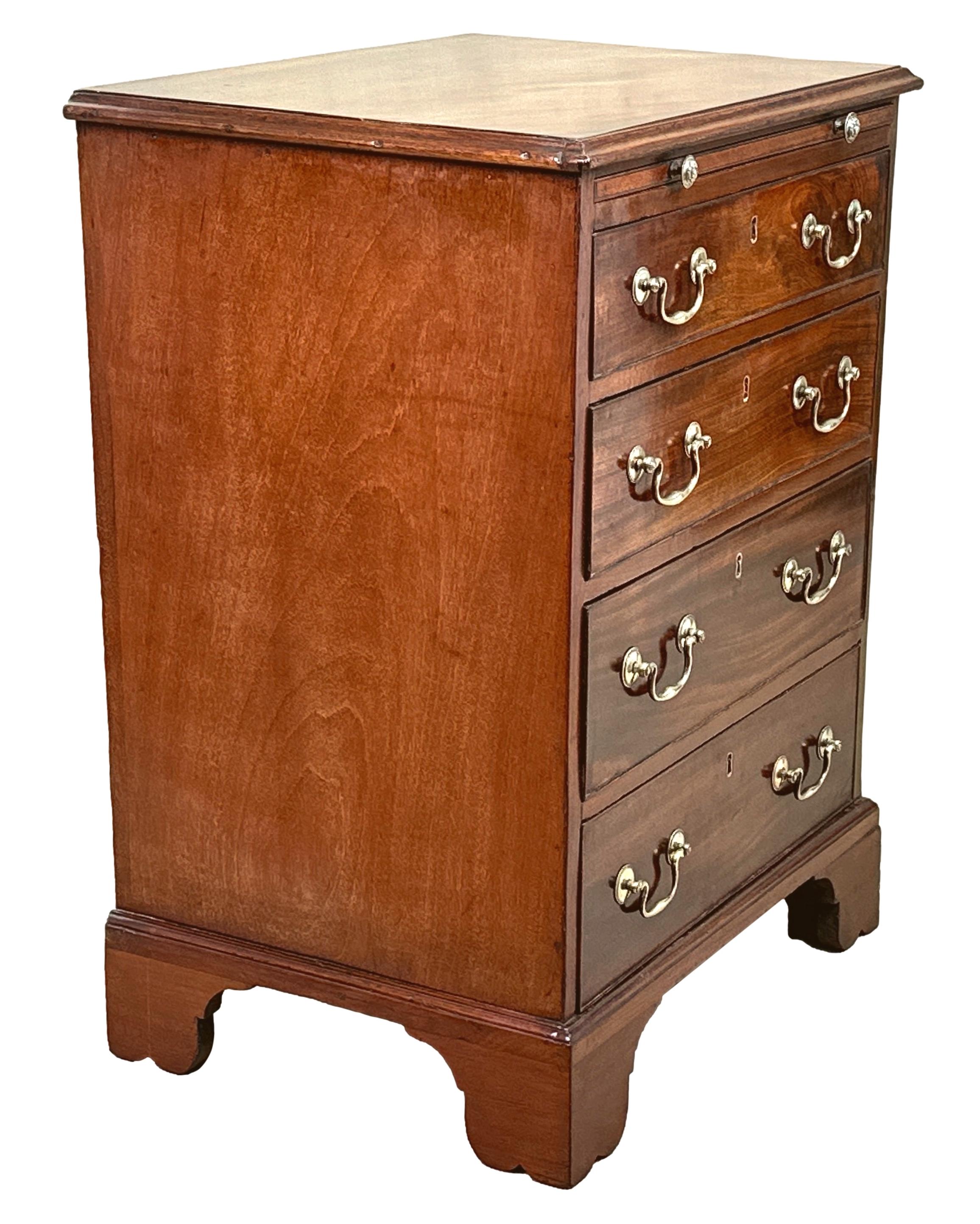 A Charming 18th Century, Chippendale Period, Mahogany Chest Of Exceptionally Rare Small Proportions, Retaining Superb Untouched Colour And Patina Throughout, With Well Figured Recvtangular Top Over Slide And Four Drawers, With Original Brass Swan