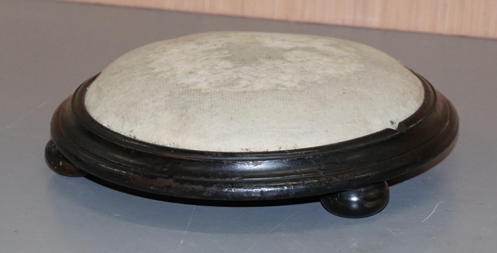We are delighted to offer for sale this lovely very small Georgian footstool with original upholstery

A good looking period original stool, very small by modern standards, its totally original, the ebonized frame, the upholstery

The condition