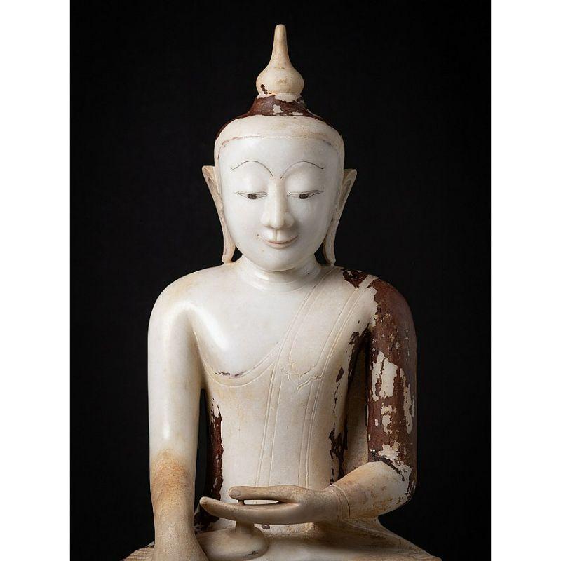Material: marble
92,5 cm high 
54 cm wide and 31 cm deep
With traces of the original lacquer and 24 krt. gilding
Shan (Tai Yai) style
Bhumisparsha mudra
Originating from Burma
17th century
Alabaster Buddha statues in this high quality, size and age