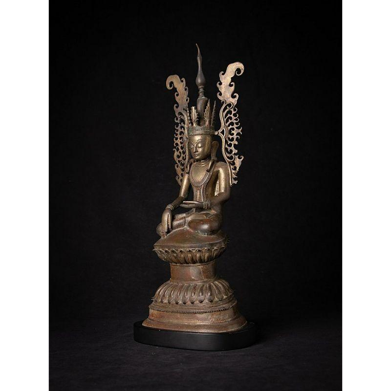 Material: bronze
48 cm high 
20,4 cm wide and 13,6 cm deep
Weight: 3.677 kgs
Shan (Tai Yai) style
Bhumisparsha mudra
Originating from Burma
17th century
One of the most beautiful bronze crowned Shan Buddhas that I ever had in my collection