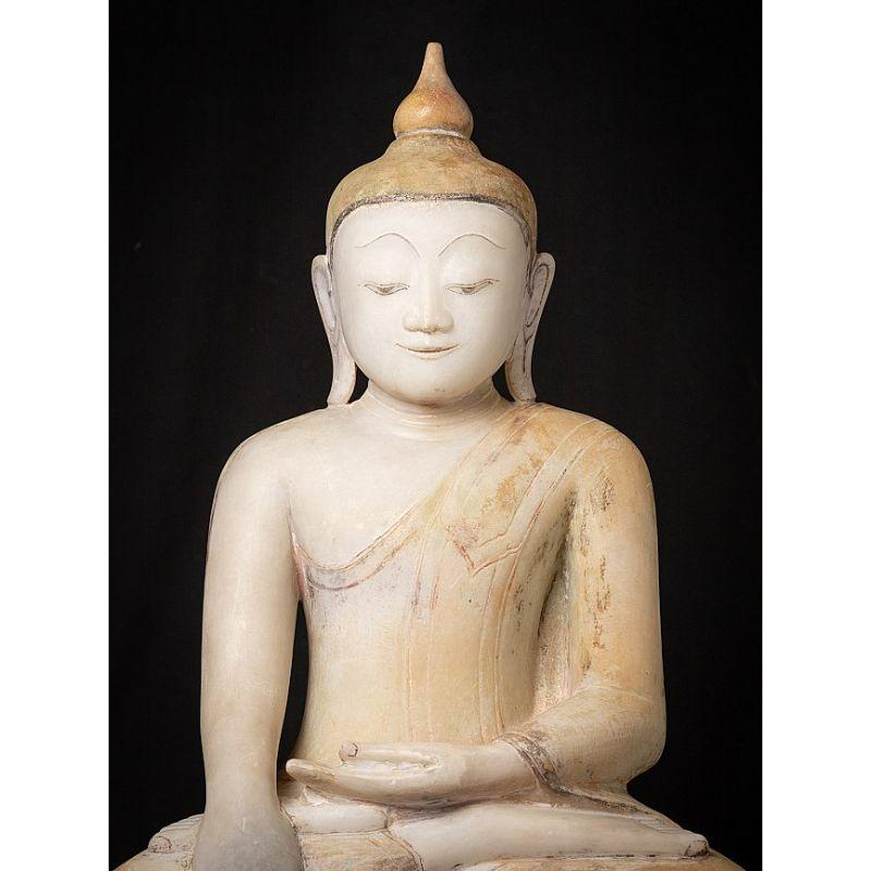 Material: marble
86 cm high 
50 cm wide and 31 cm deep
Weight: 112.95 kgs
Shan (Tai Yai) style
Bhumisparsha mudra
Originating from Burma
17th century
Still in very good condition !
Very special !

