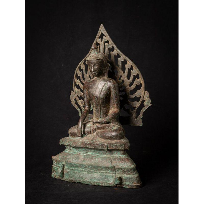 Material: bronze
36,2 cm high 
24,7 cm wide and 13,7 cm deep
Weight: 3.380 kgs
Ava style
Bhumisparsha mudra
Originating from Burma
15-16th century
Still with the original back plate
Very special !

