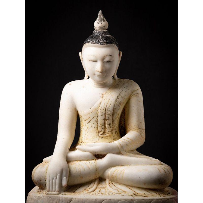Material: marble
70 cm high 
49 cm wide and 32 cm deep
Weight: 77.85 kgs
Shan (Tai Yai) style
Bhumisparsha mudra
Originating from Burma
17th century
Still in exceptional good condition, very special !

