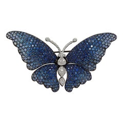 Broche papillon très spéciale avec saphirs bleus de 8,55 carats et diamants de 0,62 carat