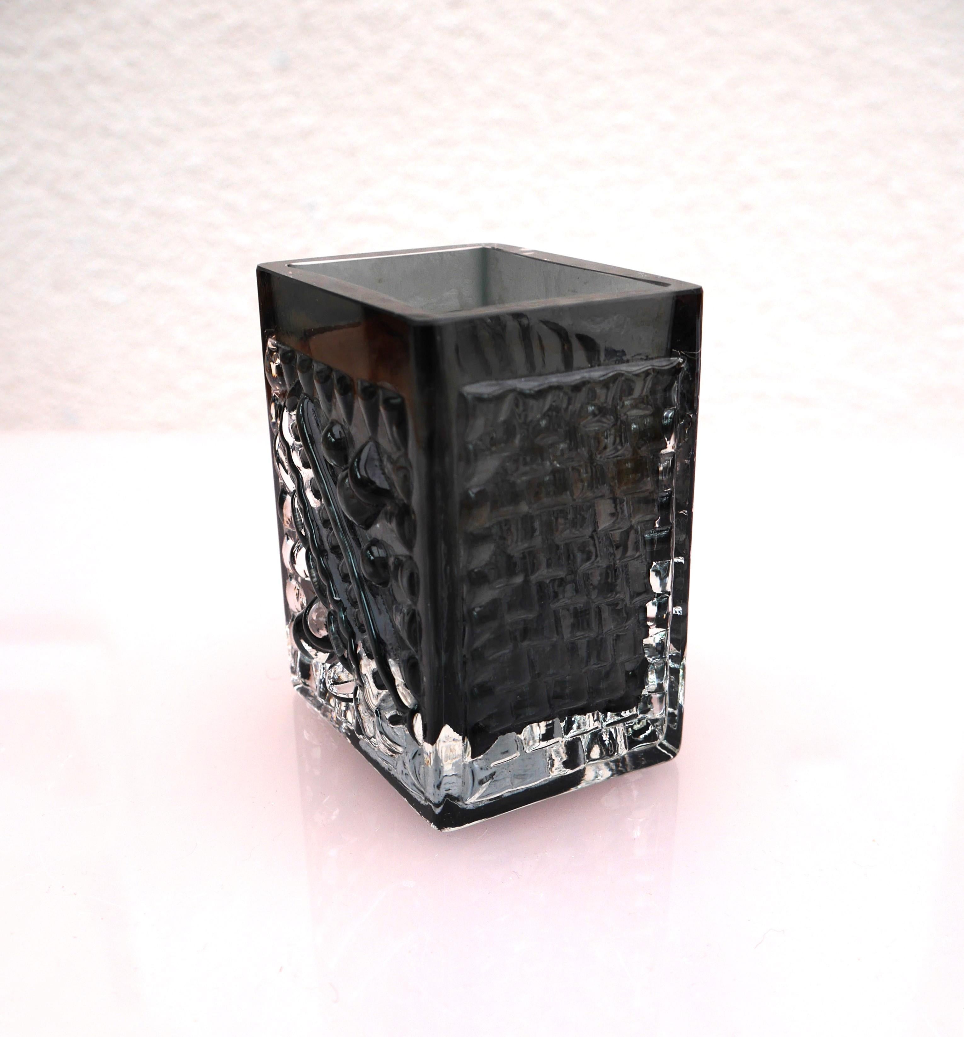 This is a stunning vintage art glass vase, by the very talented Josef Schott made at Smålandshyttan, Sweden. The colour is a dark grey almost black and it has a fantastic pattern, made in the 1970's. The vase oozes 70s design and will be an addition