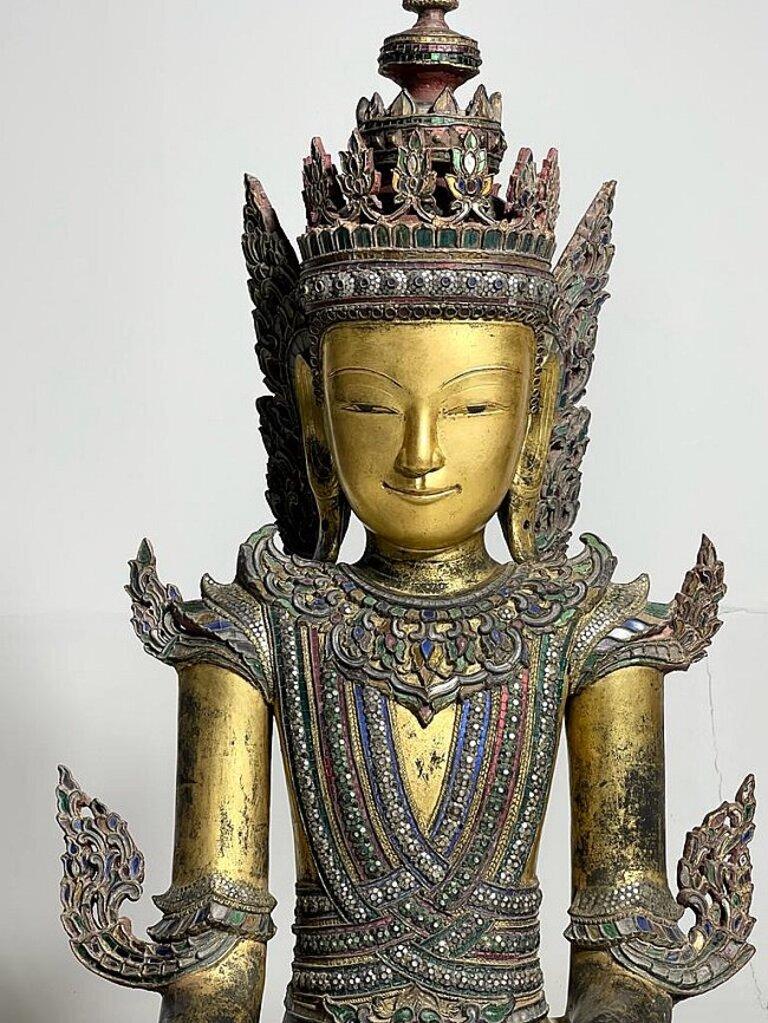 Material: lacquerware
127 cm high 
83 cm wide
Gilded with 24 krt. gold
Shan (Tai Yai) style
Bhumisparsha mudra
Originating from Burma
18th century
A very beautiful and large piece !
Still in perfect condition
Will arrive in March 2022
Not cheap, but