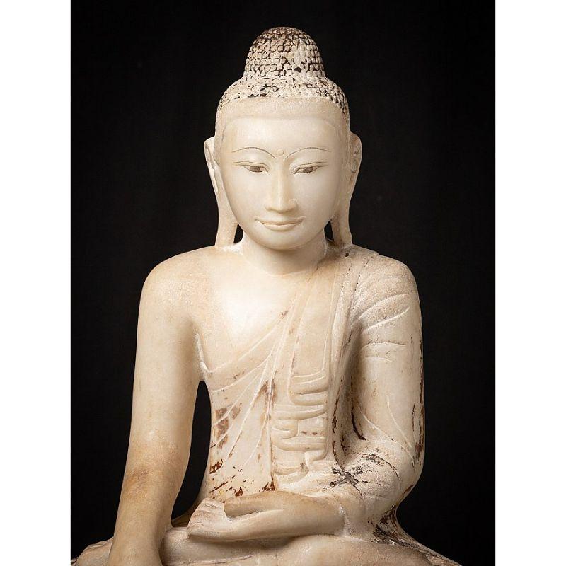 Material: marble
77,5 cm high 
52,5 cm wide and 32 cm deep
Weight: 98.05 kgs
Mandalay style
Bhumisparsha mudra
Originating from Burma
19th century
Marble Burmese Buddha statues in this quality & size are very rare!.

