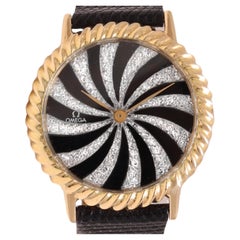 Sehr spezielle Omega-Armbanduhr in 18 kt. Gelbgold