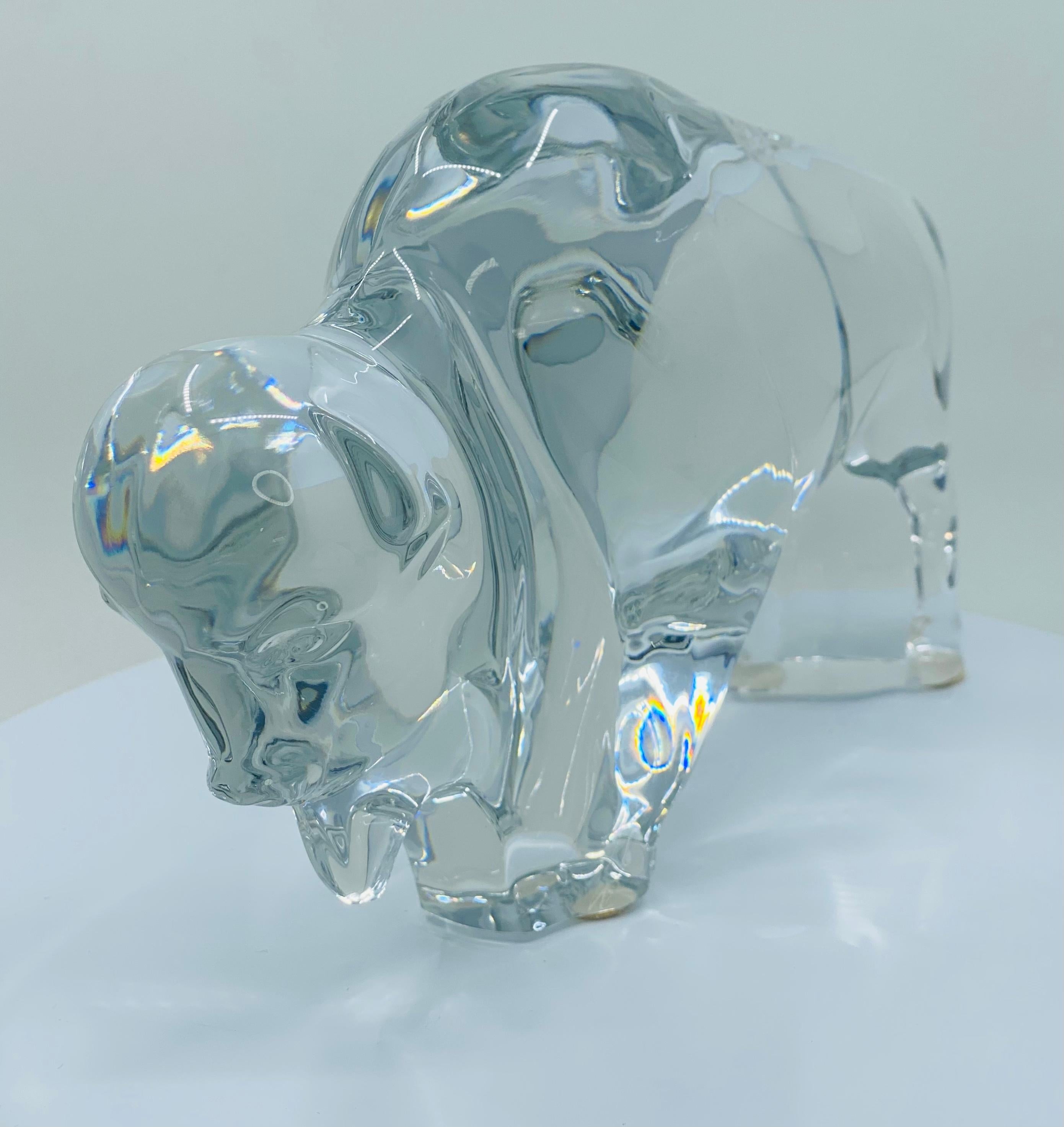 Beautifully handmade and hand blown in France, Baccarat crystal buffalo animal figurine. Very stately, in the true form and quality as Baccarat is known to be, the buffalo will make a great addition to any home or office. Etched signed with the