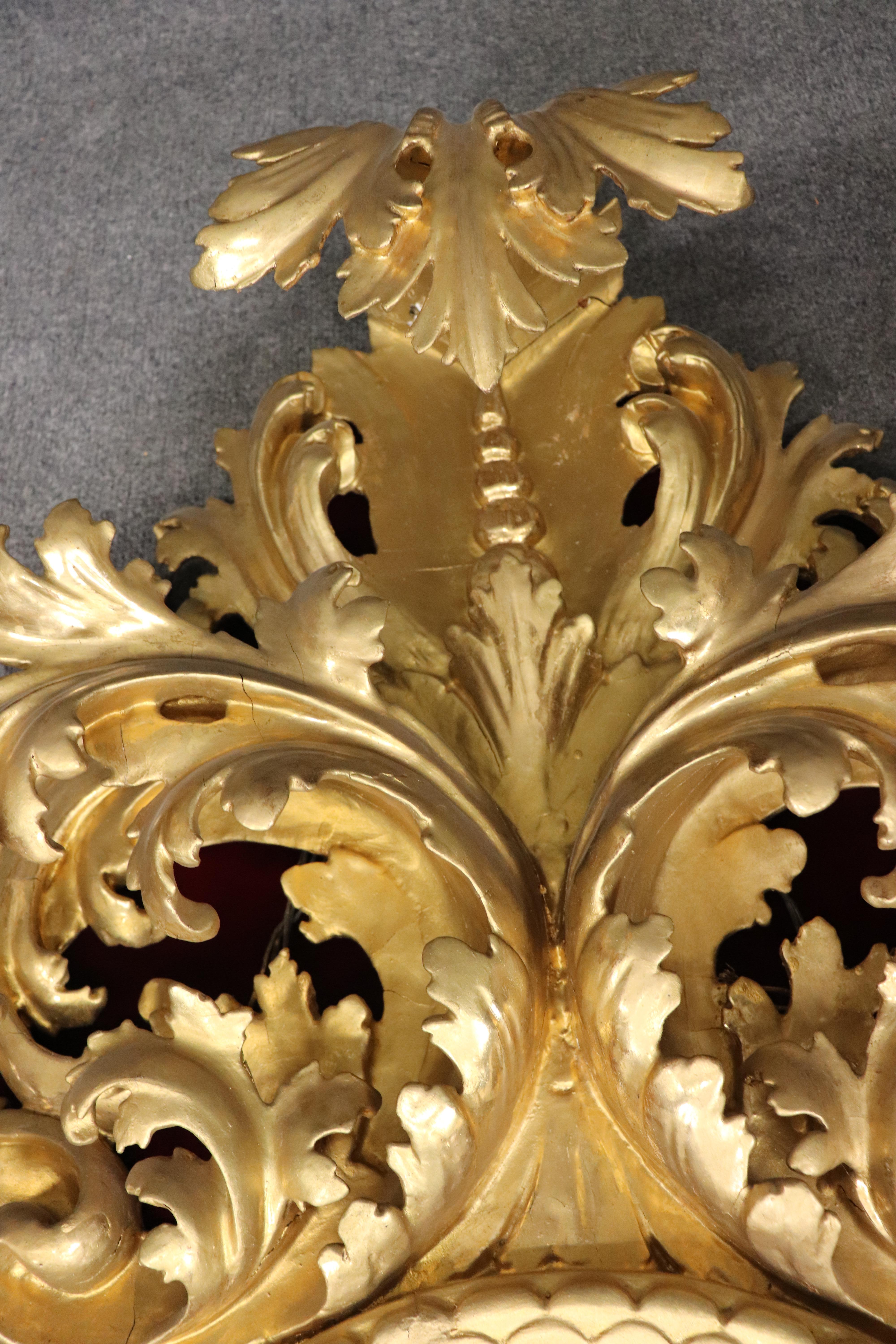Very Tall Carved Gilded Italian Florentine Oval Leaf Beveled Mirror For Sale 1