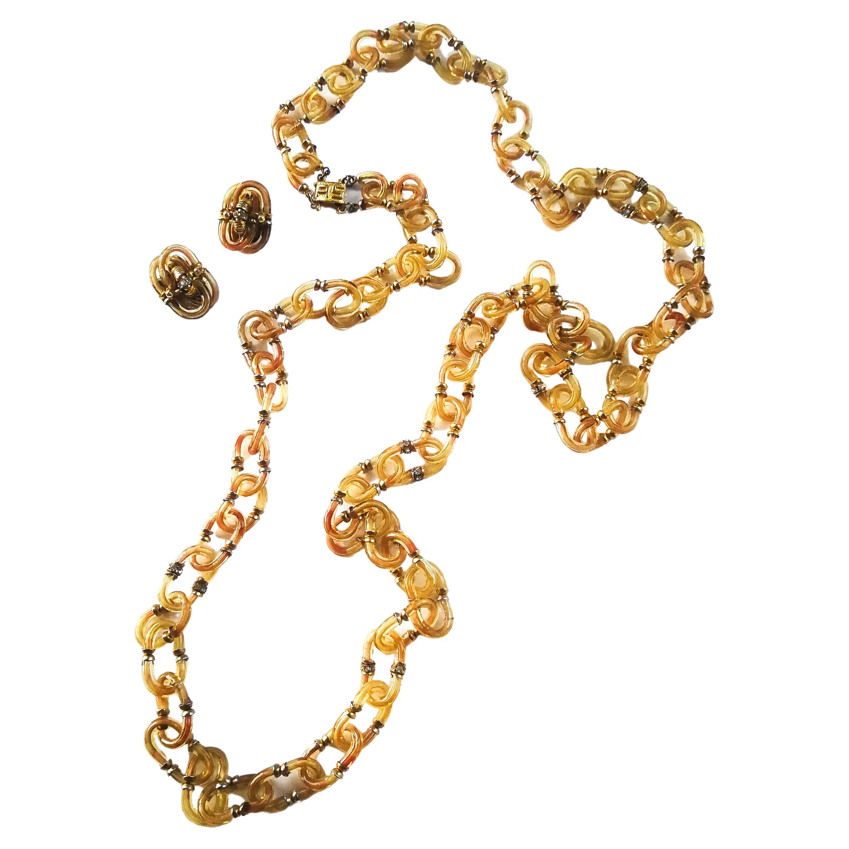 An exceptionally long, clear paste and gilt metal chain, Seguso/Chanel, c1968 For Sale