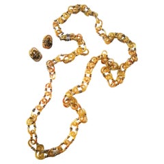 An exceptionally long, clear paste and gilt metal chain, Seguso/Chanel, c1968