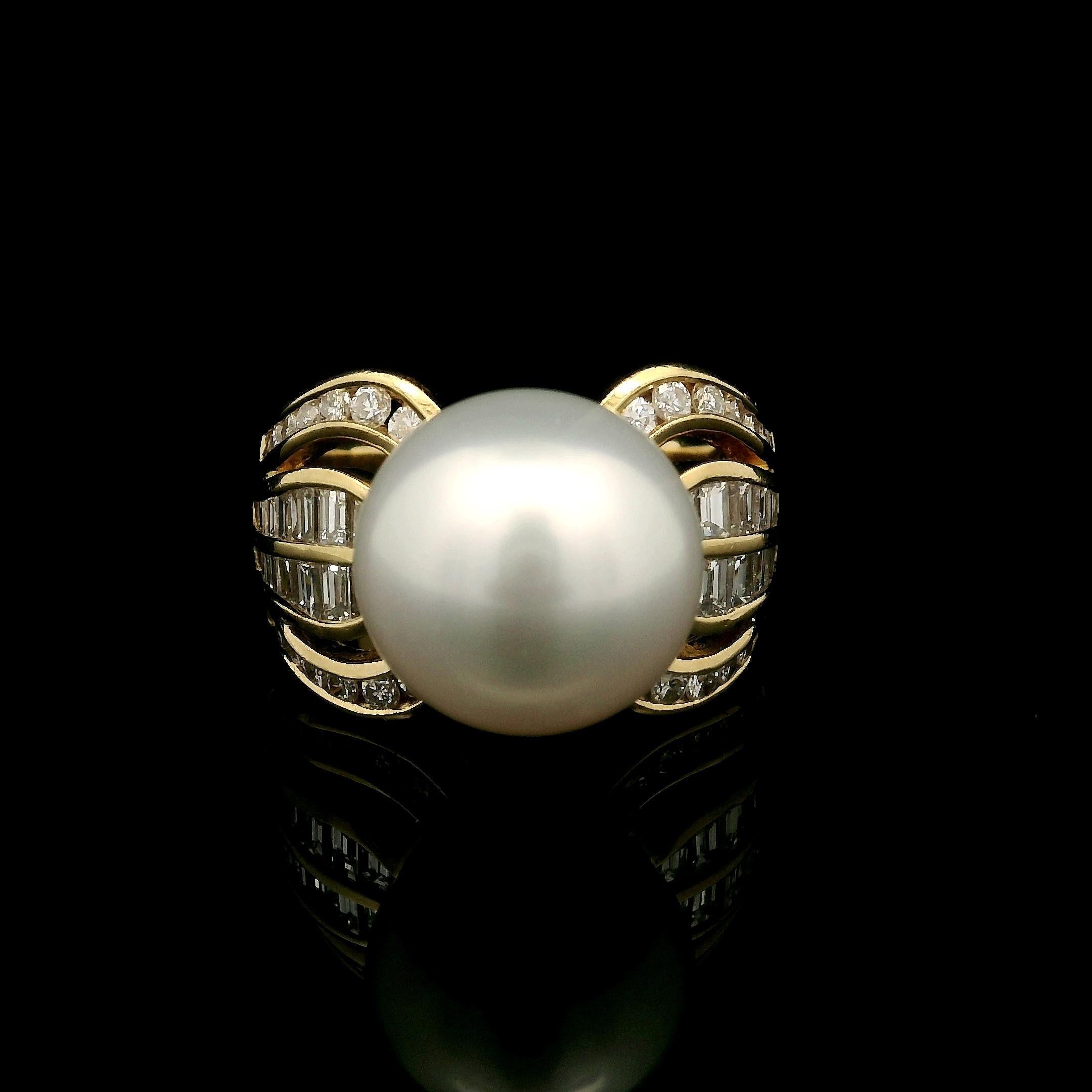 --Stone(s):--
(1) Genuine Cultured Pearl -Off Round Shape- Pure White Color - Excellent Luster - 12.8mm (approx.)
Natural Genuine Diamonds - 28 Round Brilliant Cut w/ 32 Baguette Cut - Channel Set - F/G Color - VS1/VS2 Clarity - 1.47ctw
