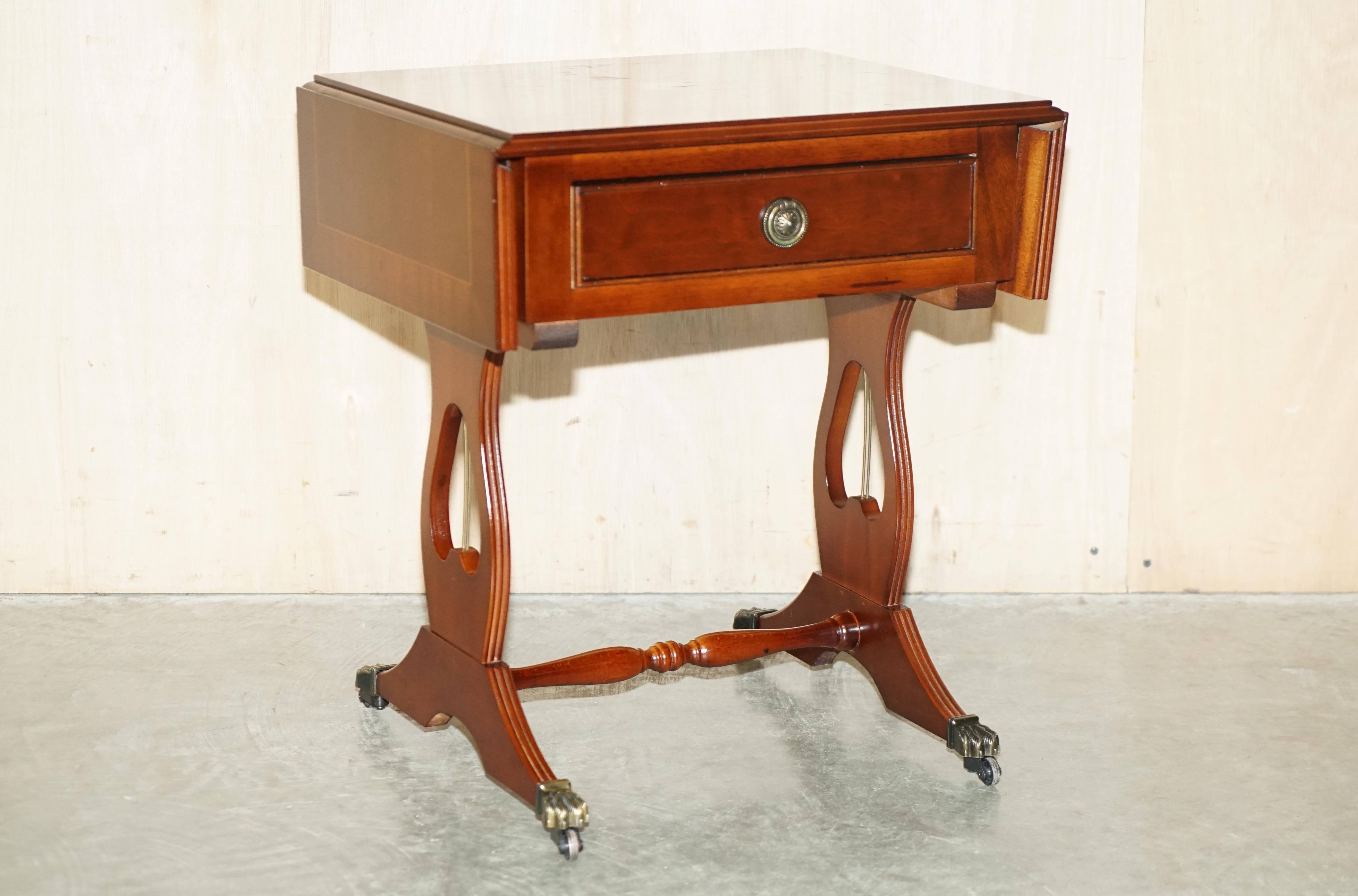 We are delighted to offer for sale this lovely flamed mahogany Bevan Funnell extending side table with a full sized single drawer and Lions's Hairy Paw castors 

This table is very well made, its extends so can be used as a card table or for