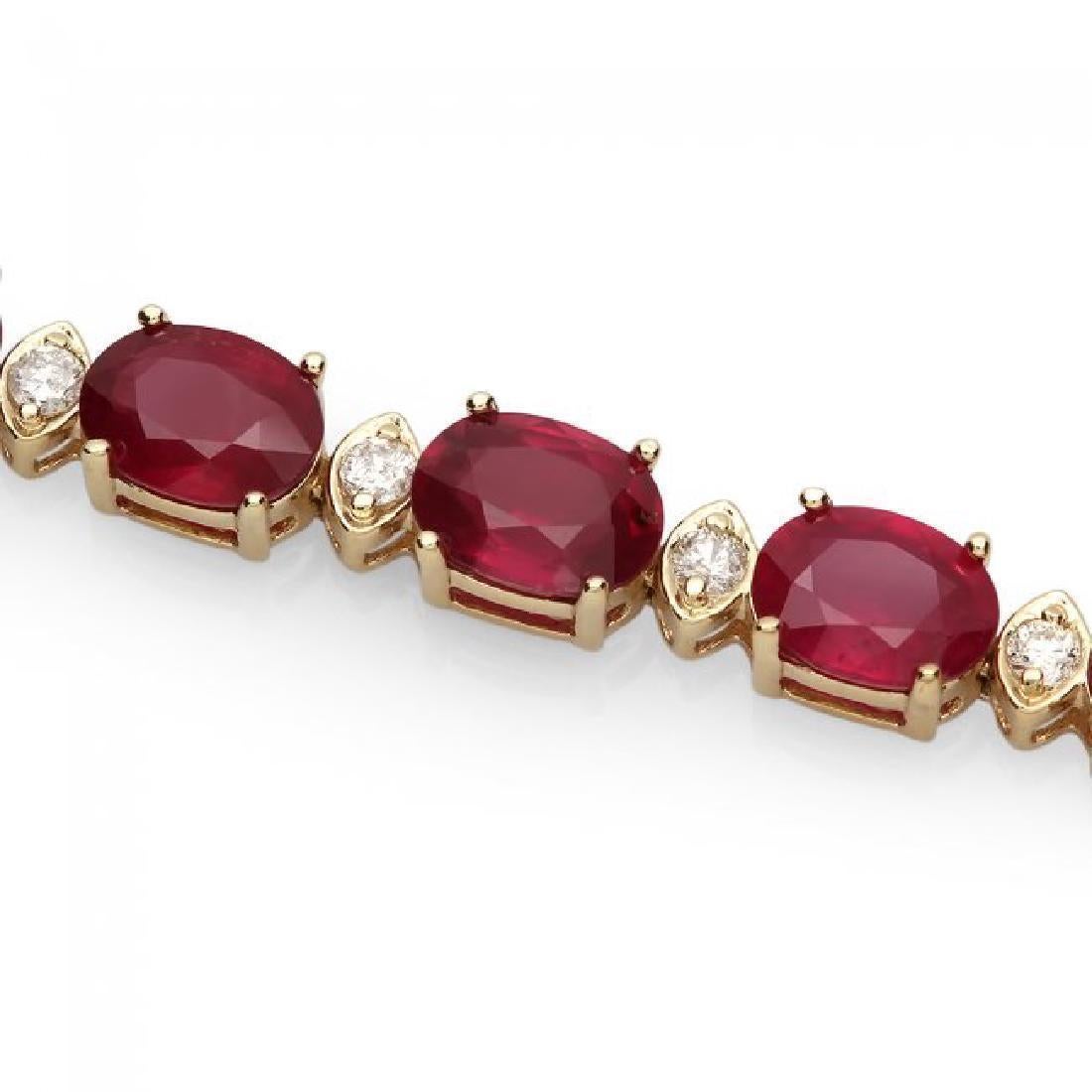 Very Impressive 26.90 Carats Natural Red Ruby & Diamond 14K Solid Yellow Gold Bracelet

STAMPED: 14K

Total Natural Round Diamonds Weight: Approx. 0.90 Carats (color G-H / Clarity SI1-2)

Total Rubies Weight is: Approx. 26.00 carats

Ruby Treatment: