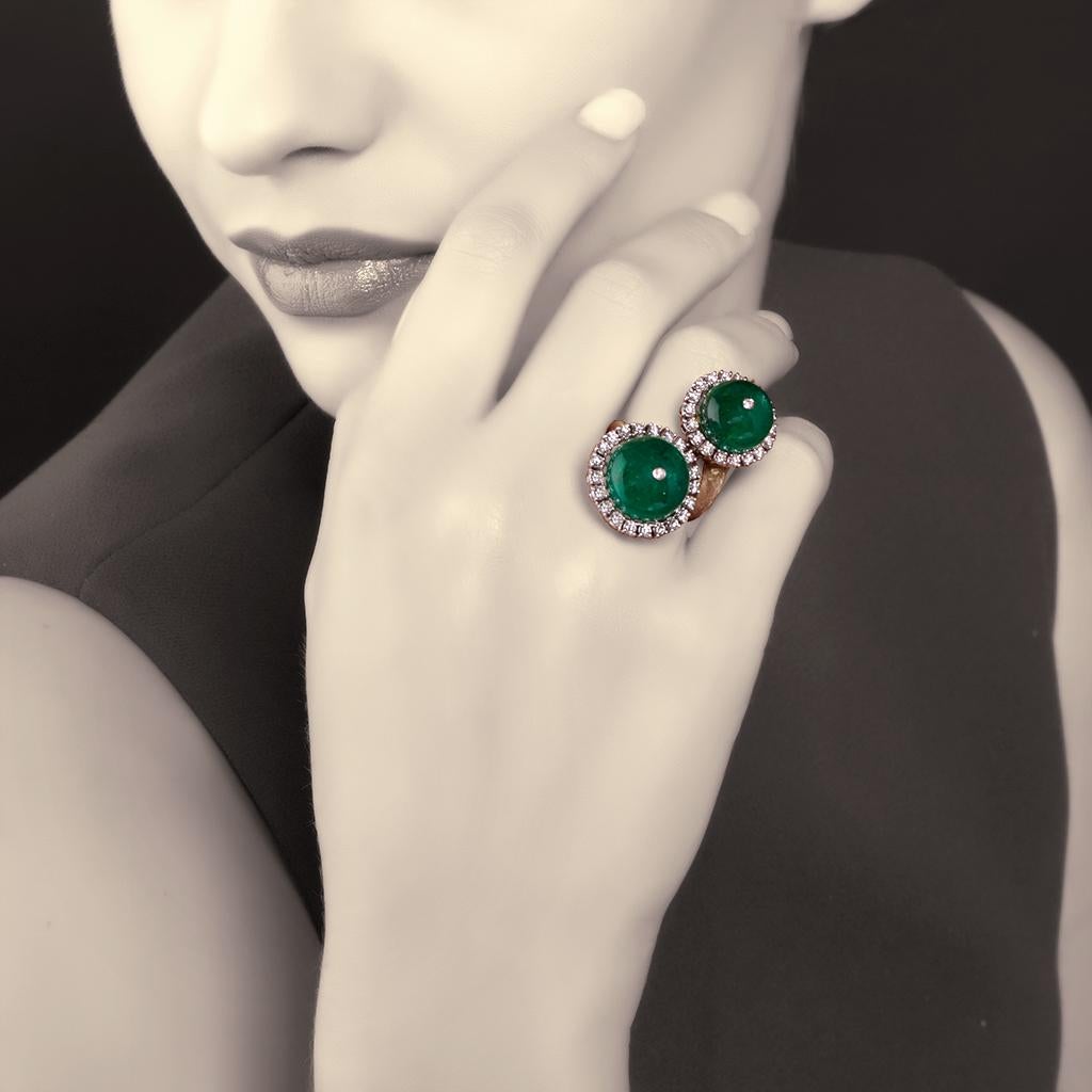 Adorable and colorful like candies, the two charming Cabochon-cut Emeralds for 27,77 carats play together in a twisting game. The vibrant Green colour of the Emeralds is enhanced by the 1,51 carats of Brilliant-cut Diamonds, G colour, IF clarity,