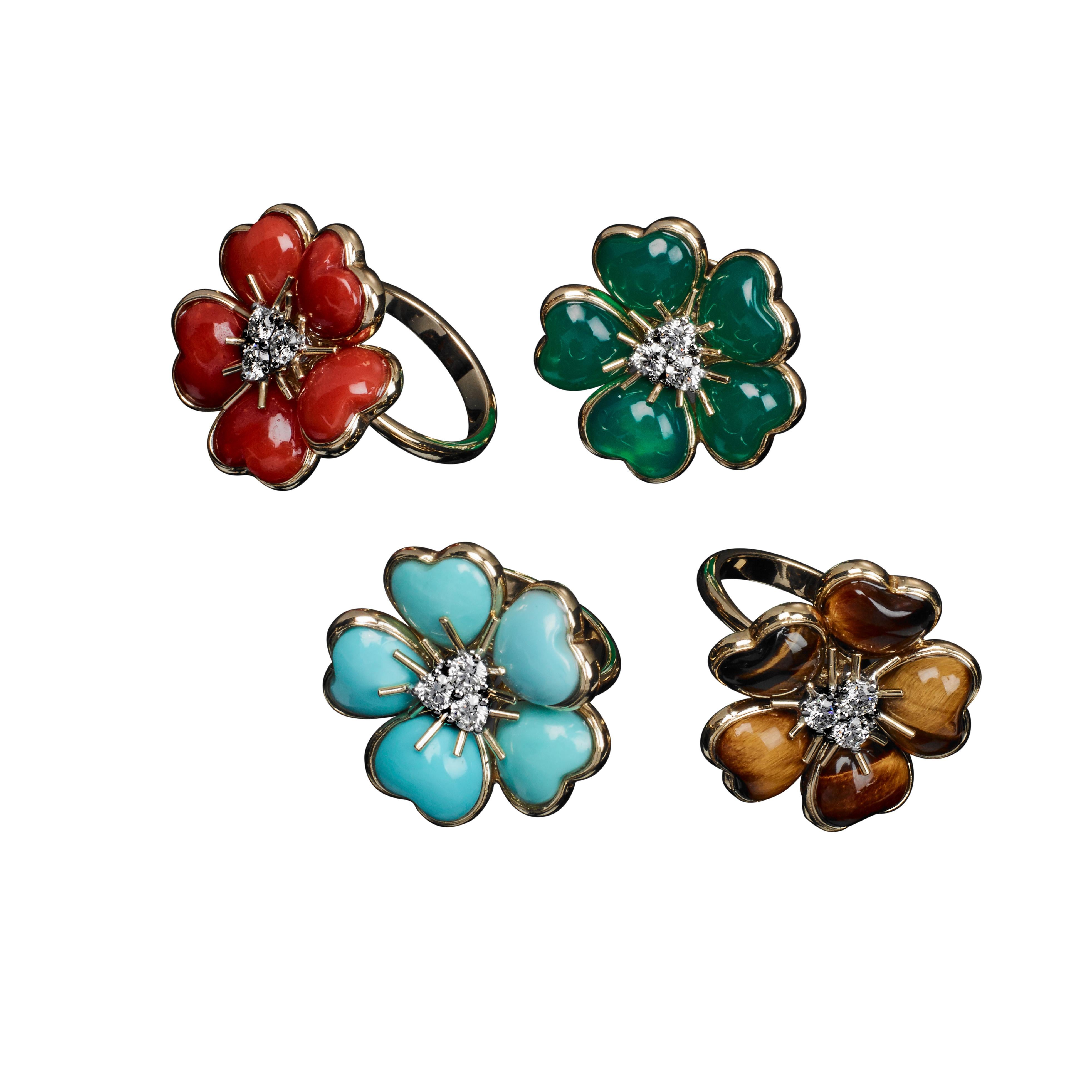18 kt Yellow Gold Flower Ring adorned with Turquoise Inlays, resembling nice and charming petals, enriched with 0,32 carats of Brilliant-cut Diamonds, G colour, IF clarity.
The ring is part of the lovely, multi-coloured, joyful Collection: 