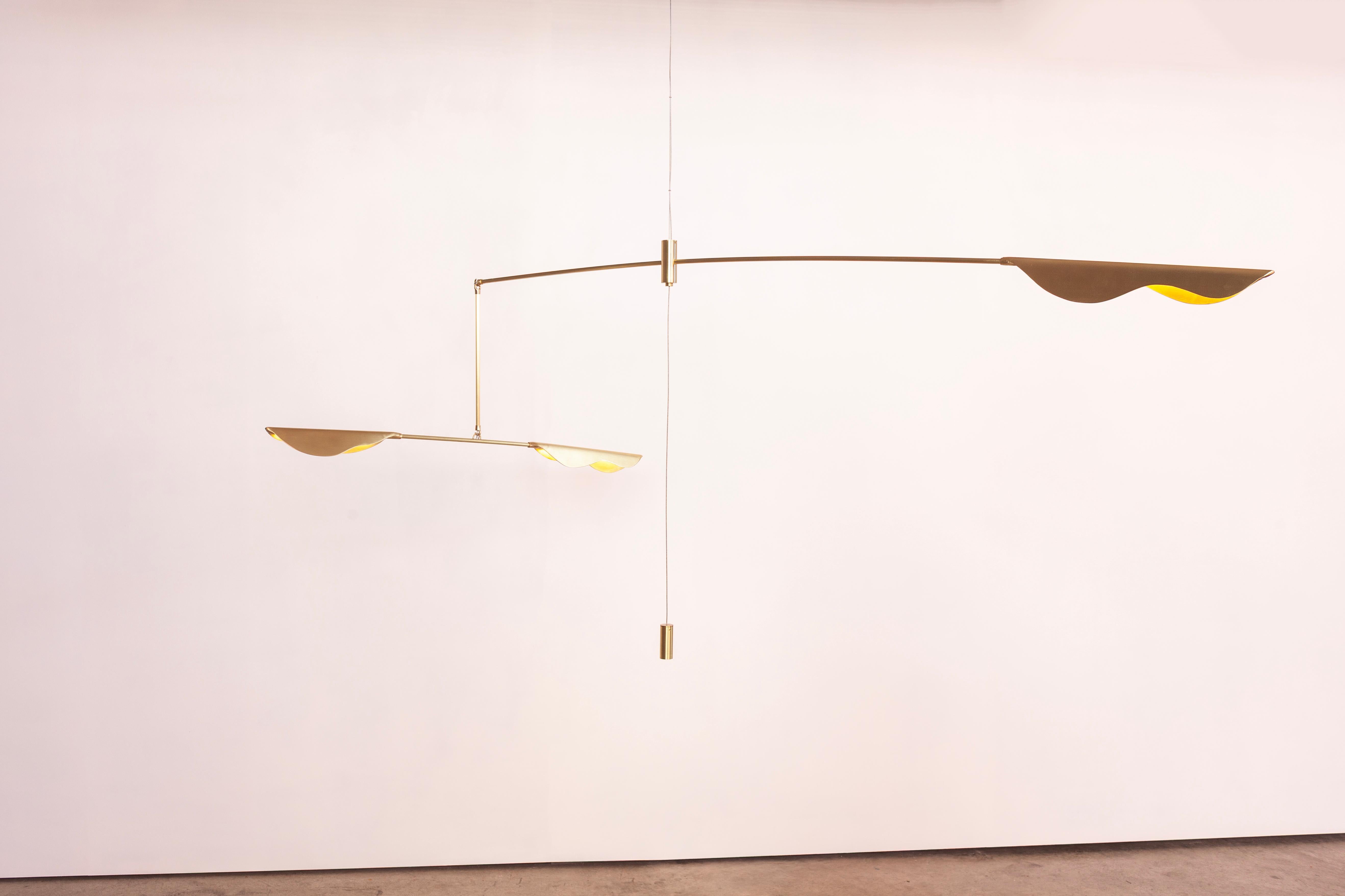 Vesper Pendant Lamp by Morghen Studio
Dimensions: 190 x 80 x 80 cm
Materials: Satin brass, LED light, Silicone.

Standard features:
Light source: COB LED - 24v DC - 12w - 2700k - dimmable
Spotlight - 24v DC - 4.8w - 2700k - dimmable
Driver: MW LRS