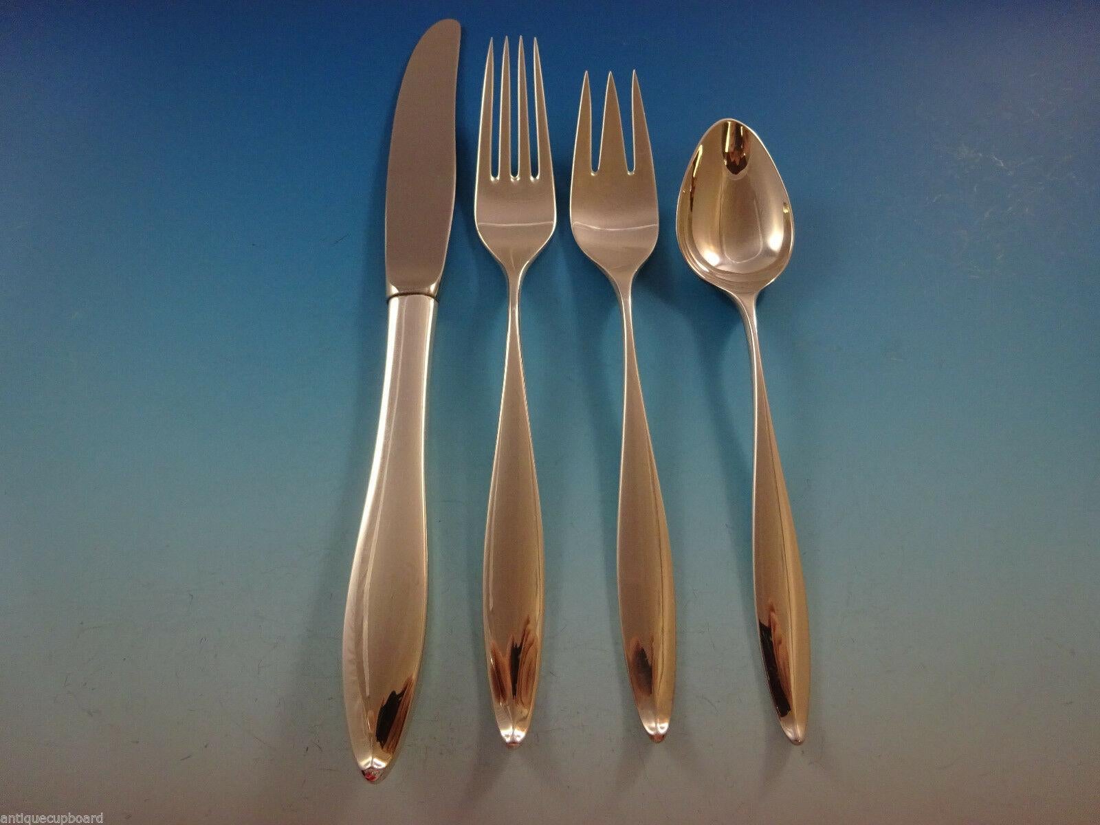 Modern, sleek, and unadorned Vespera by Towle sterling silver flatware set - 53 pieces. This set includes:

8 knives, 9