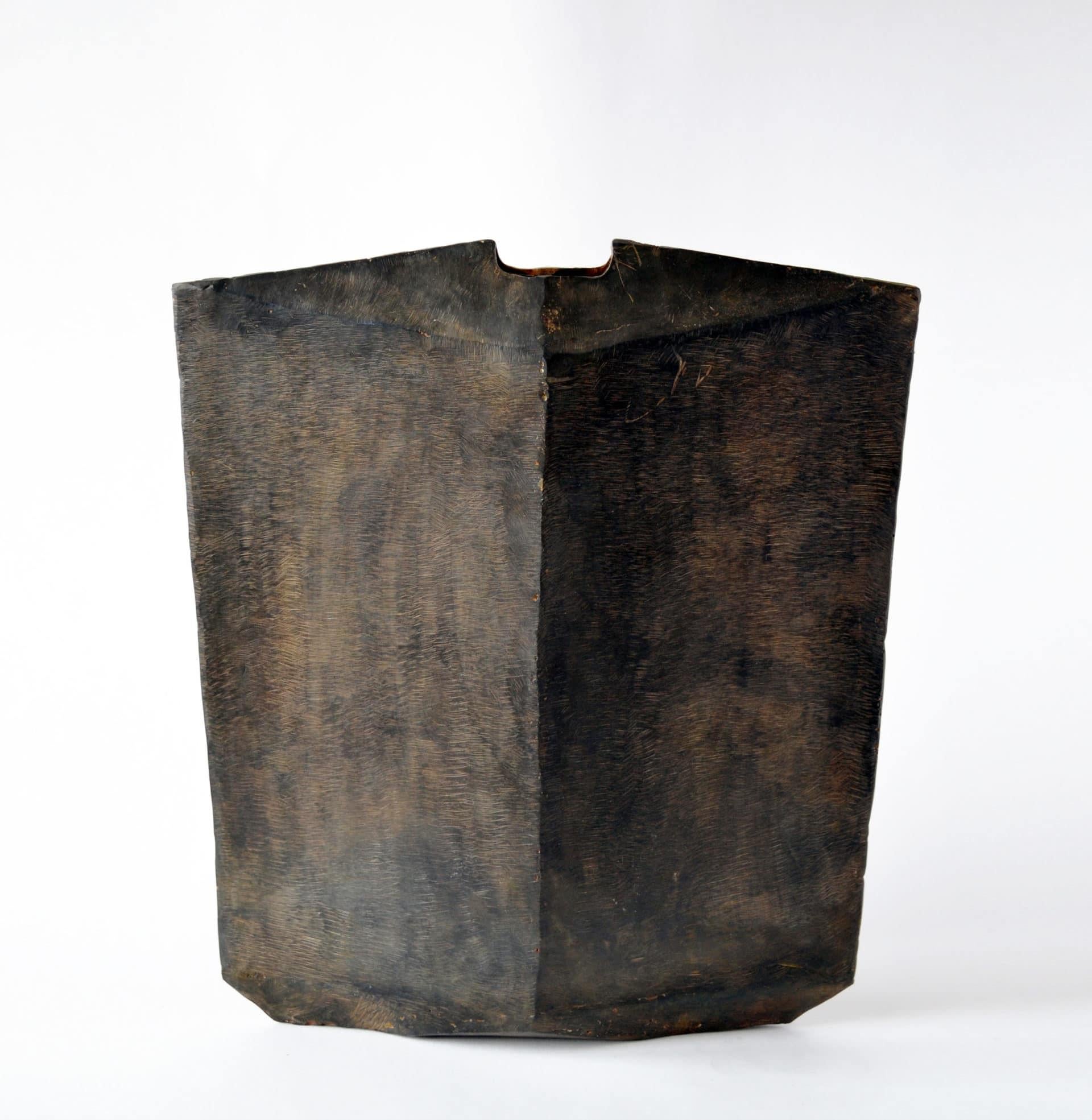 Many facets form this unique object. Mathematically designed and hand-wrought.

Blackened steel, waxed finish, suede base.

Each vessel is unique and will vary slightly in size and shape from description.

Handmade in Brooklyn, New York.


 