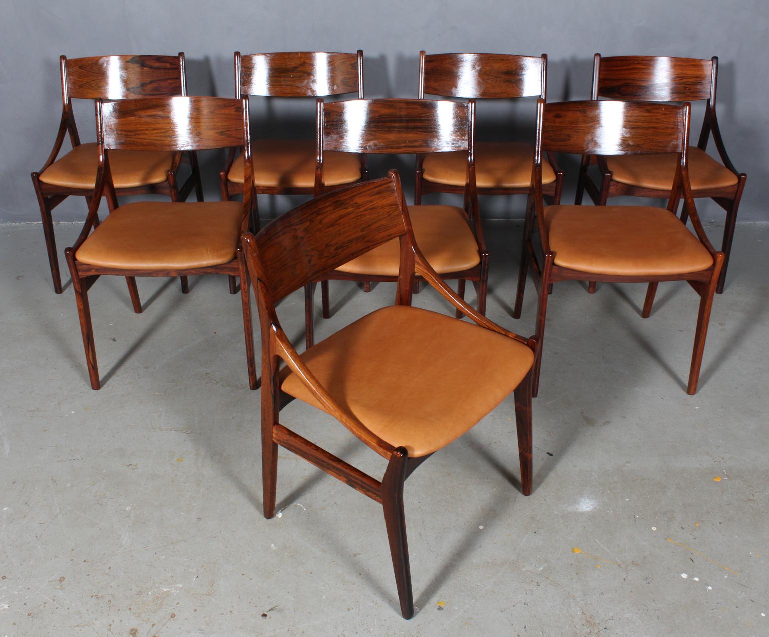 Vestervig Eriksen set of eight dining chairs in partly solid rosewood. 

Seats new upholstered with tan vintage aniline leather.

Made by Brdr. Tromborg’s Eftf., Møbelfabrik Vestervig Eriksen Aarhus.