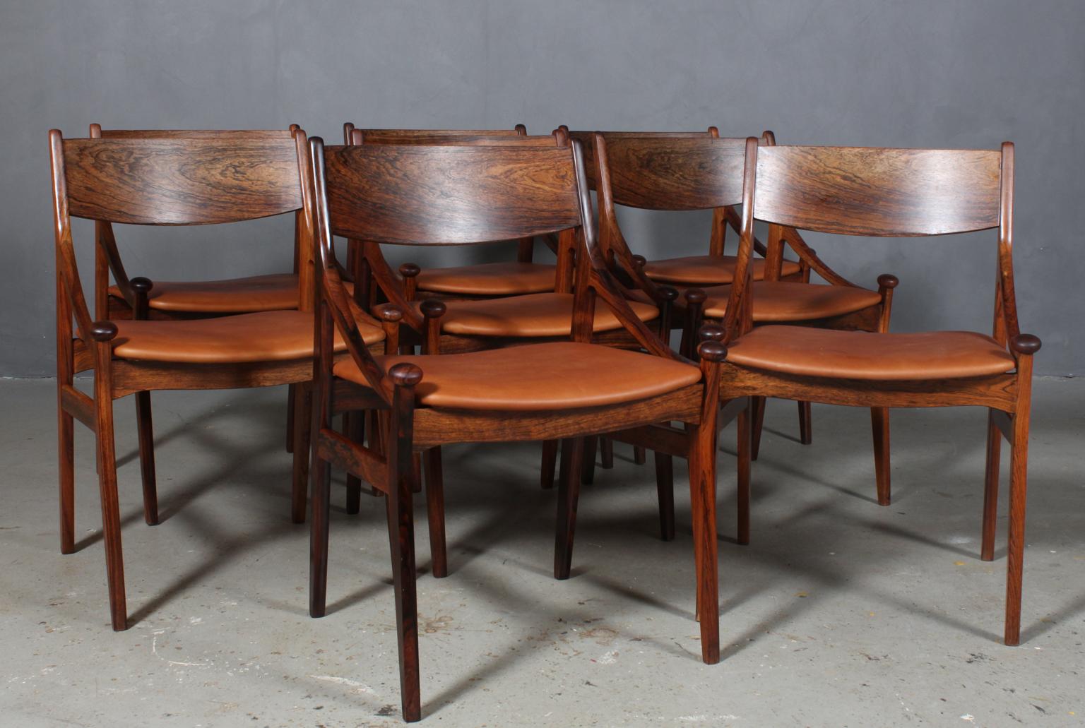 Vestervig Eriksen set of eight dining chairs in partly solid rosewood. 

Seats new upholstered with tan vintage aniline leather.

Made by Brdr. Tromborg’s Eftf., Møbelfabrik Vestervig Eriksen Aarhus.