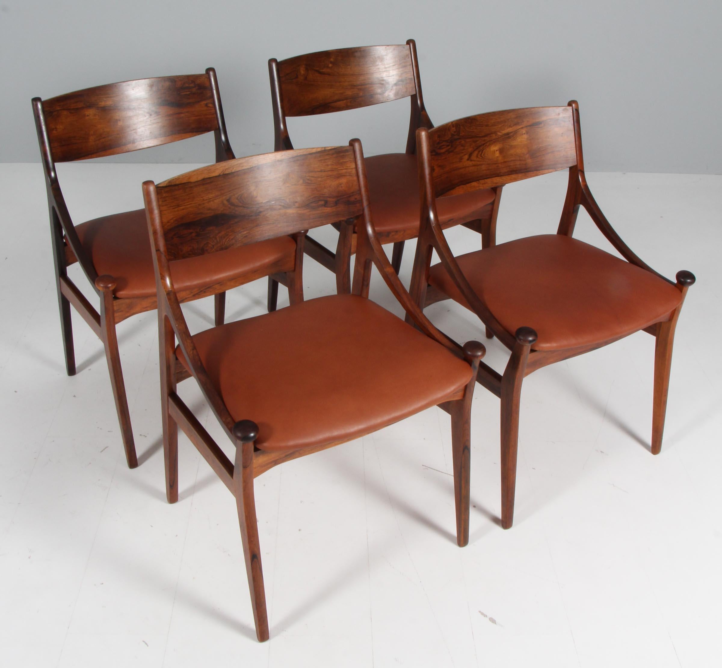 Vestervig Eriksen set of four dining chairs in partly solid rosewood.

Seats new upholstered with tan vintage aniline leather.

Made by Brdr. Tromborg’s Eftf., Møbelfabrik Vestervig Eriksen Aarhus.