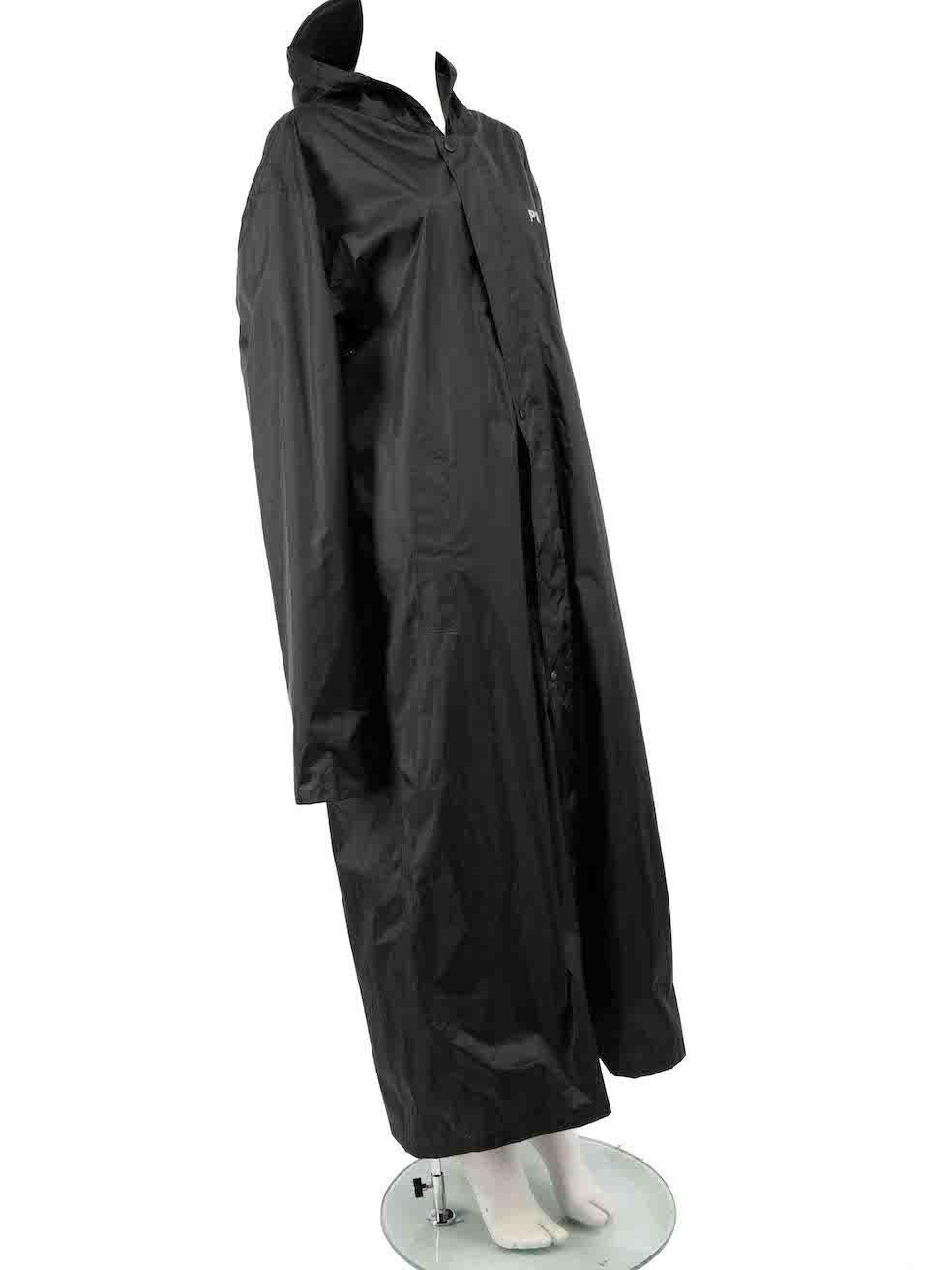 CONDITION is Good. Minor wear to coat is evident. Light scratches on the back logo of the coat. Overall marks is seen. The size label is missing on this used Vetements designer resale item.
 
 
 
 Details
 
 
 Black
 
 Polyester
 
 Raincoat
 
 Long