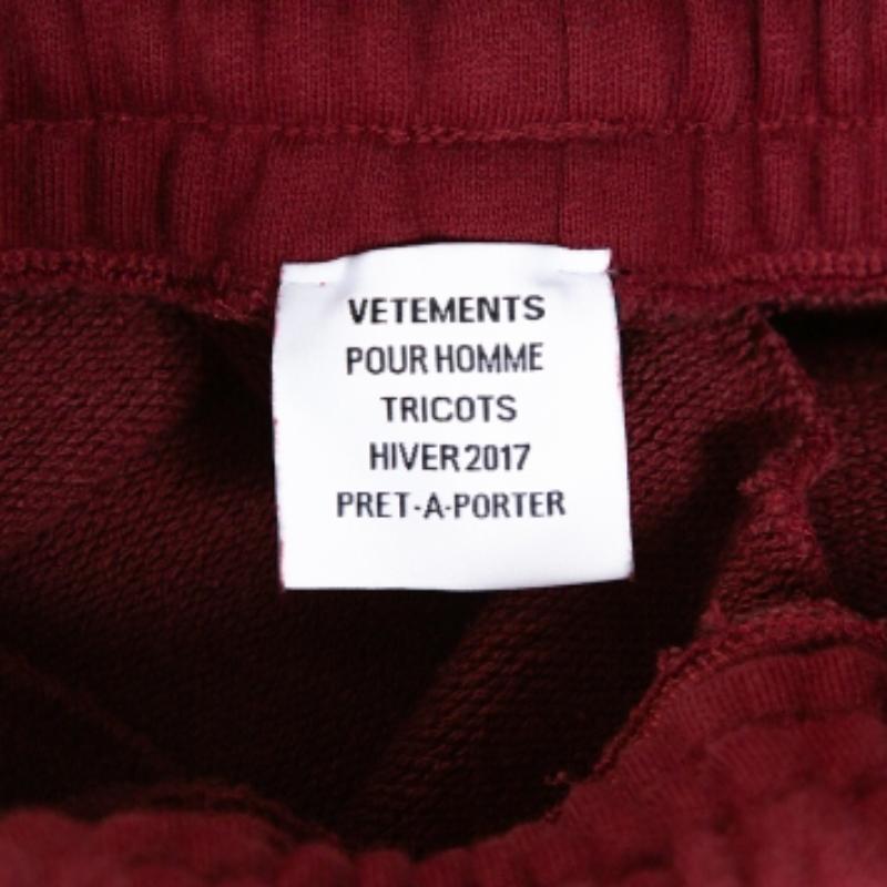 Uomo Vetements Pantaloni da pista in cotone rosso mattone con logo ricamato M. in vendita