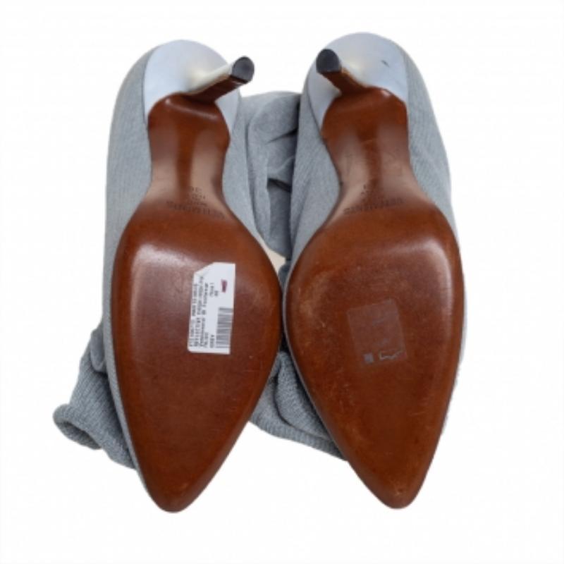 Sock boots have been a rage lately so this pair from Vetements is a must-buy. It features grey stretched socks softly constructed in reflective fabric and ribbed cuffs for a secure fit. The sole and insole are made of fine leather and it is heeled