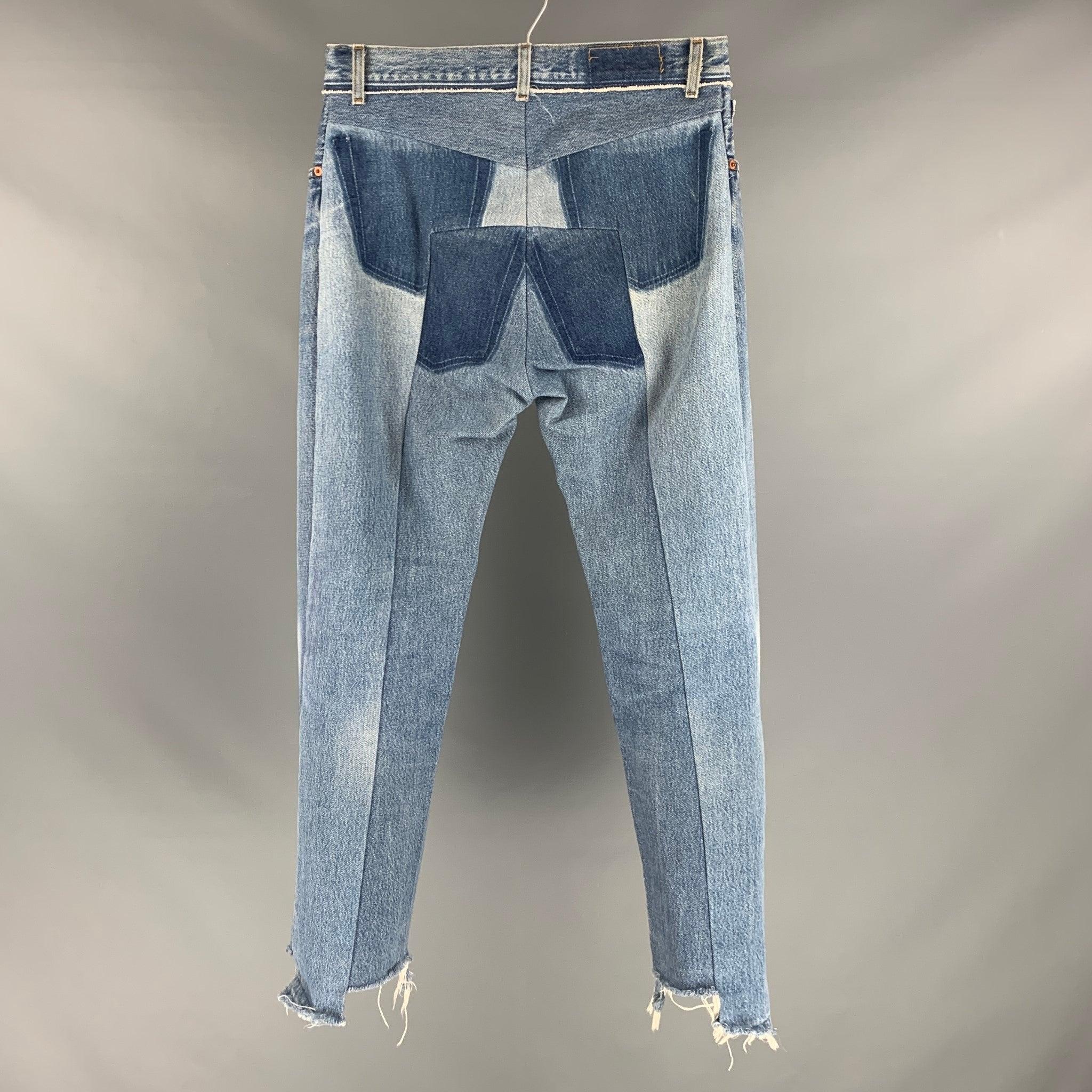VETEMENTS Size 30 Blue Distressed Cotton Button Fly Jeans In Excellent Condition For Sale In San Francisco, CA