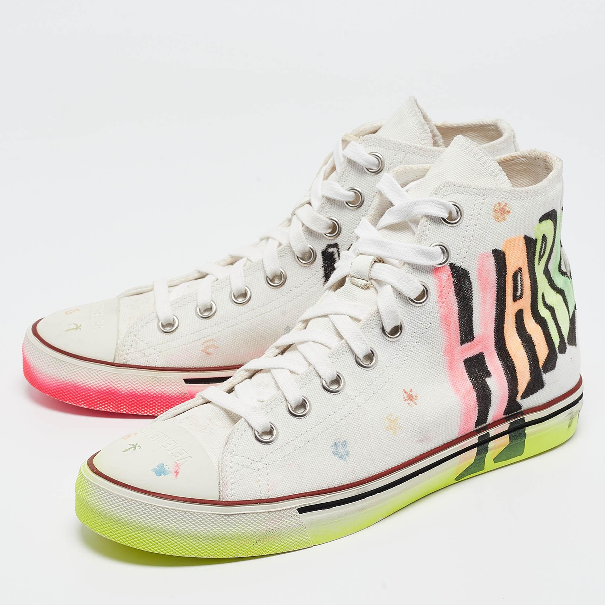 Coming in a classic silhouette these designer sneakers are a seamless combination of luxury comfort and style. These sneakers are finished with signature details and comfortable insoles.