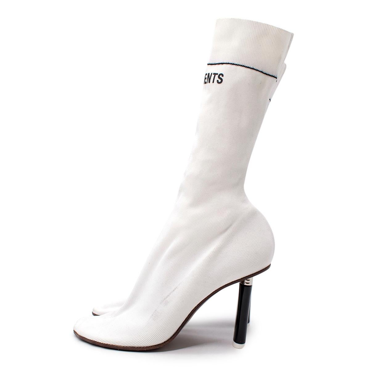 Vetements White Lighter Heel Stretch Sock Boots

- Iconic Vetements sock boot, with faux lighter heel
- White ribbed pull on design reminscent of a sports sock, with Vetements logo branding at the ankle
- Toe shaped to the natutral curve of the