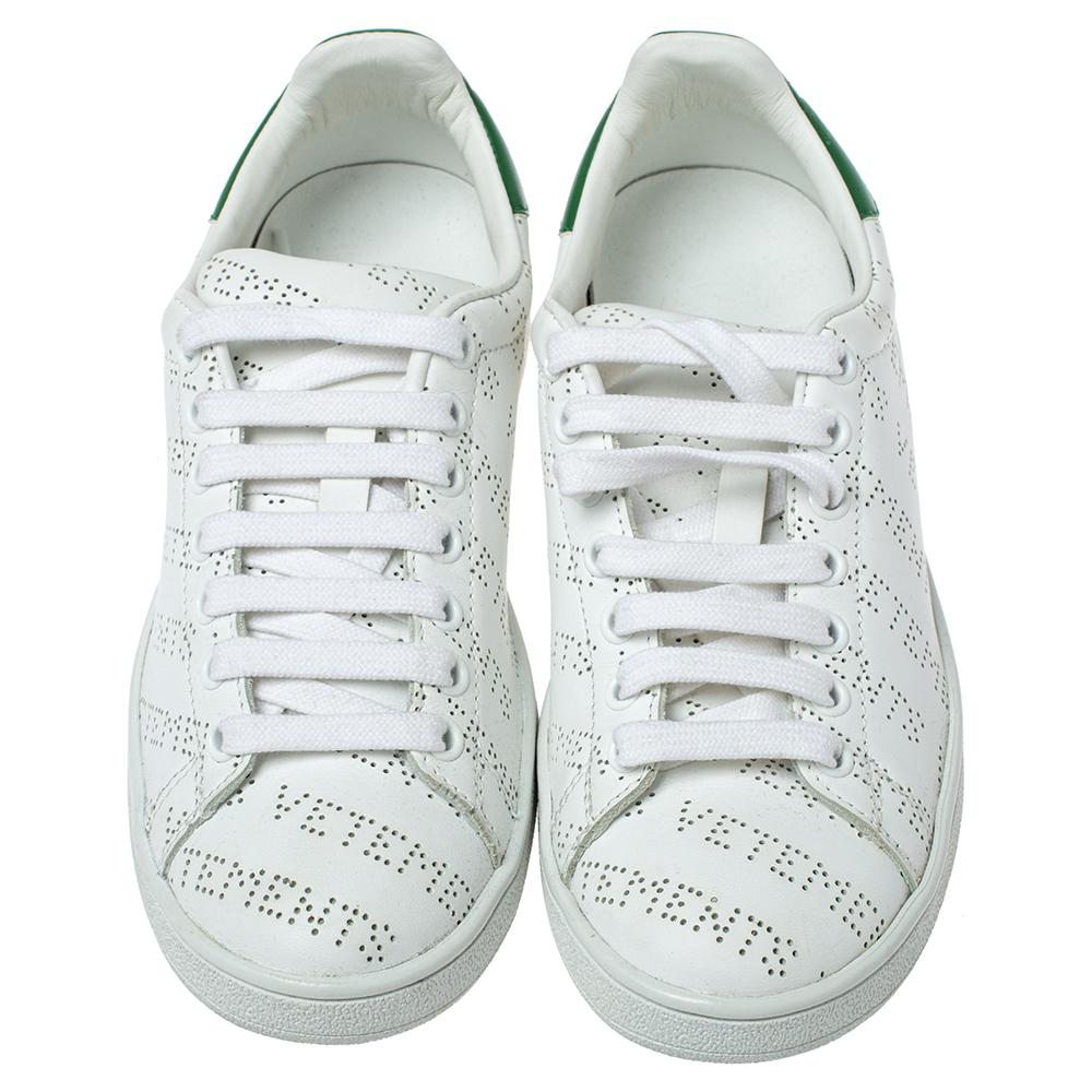 Statement-making sneakers are worth a buy, and these ones aptly justify that! The perforations of Vetements’ white trainers reflect the label’s logo-centric theme. They’re crafted in Italy from smooth leather to a low-top silhouette with green heel