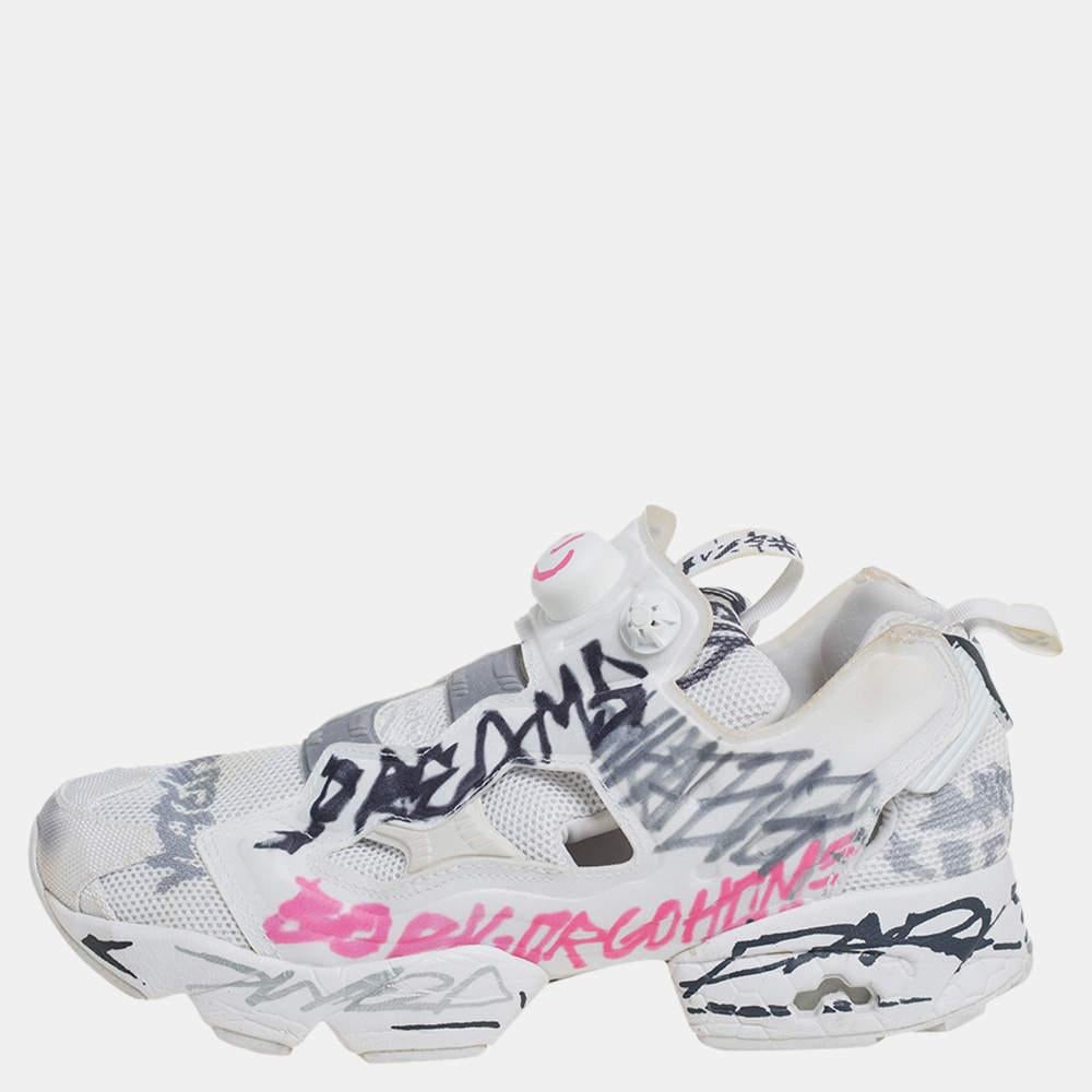 These chic sneakers are born from the Vetements x Reebok collaboration, taking into account both the brand's aesthetics. The fabric and mesh construction features an all-over display of a doodle print on Reebok's Instapump Fury design. Comfortable